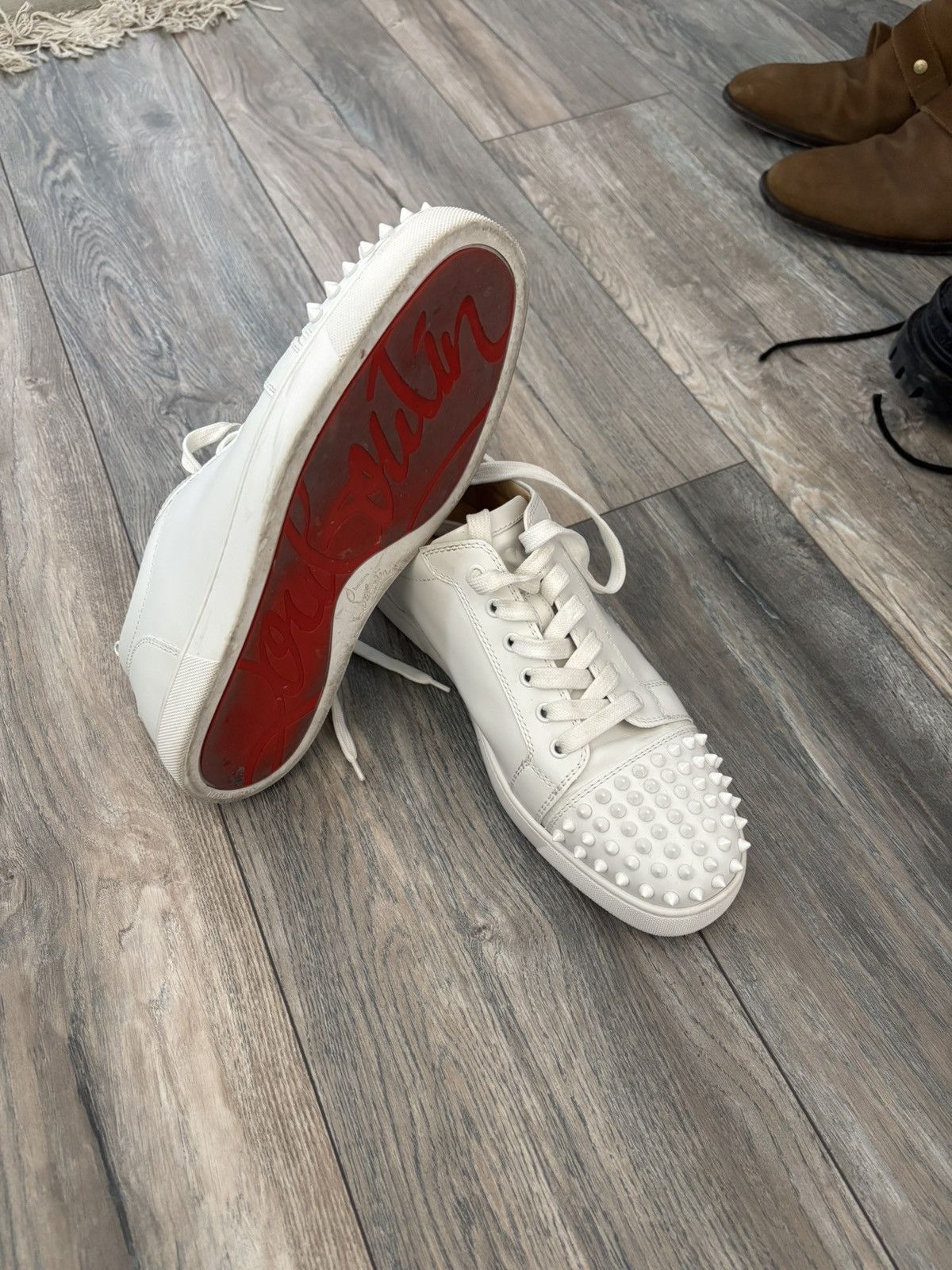 Christian loubiton spiked toebox red bottom shoe