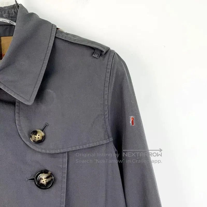 Burberry Women's Dark Blue Cotton Trench Coat.