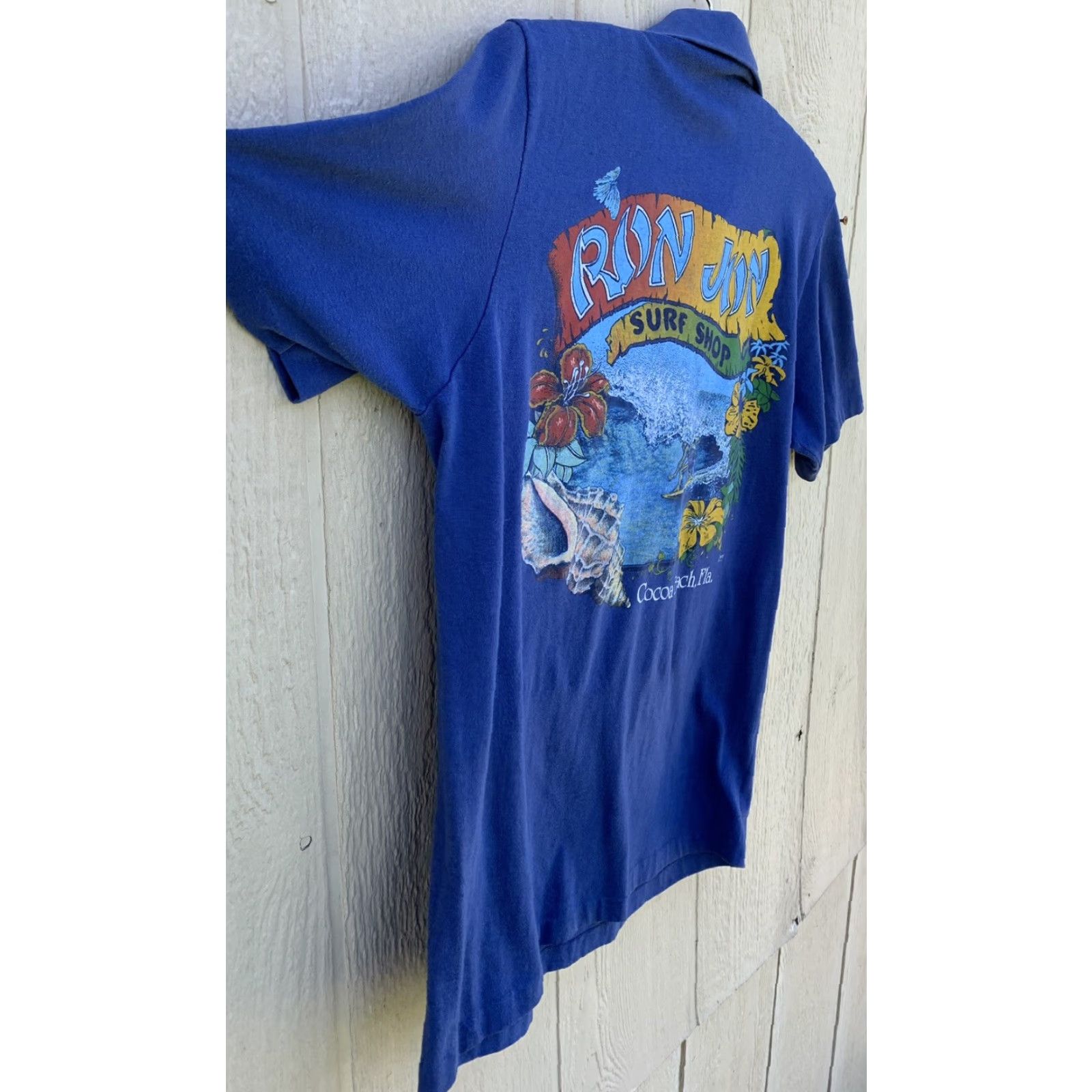 Vintage VINTAGE Ron Jon Surf Shop Cocoa Beach Florida graphic tee polo shirt M Blue Beach Flower Graphic Print T-Shirt Men Mens Size US M / EU 48-50 / 2 - 7 Thumbnail