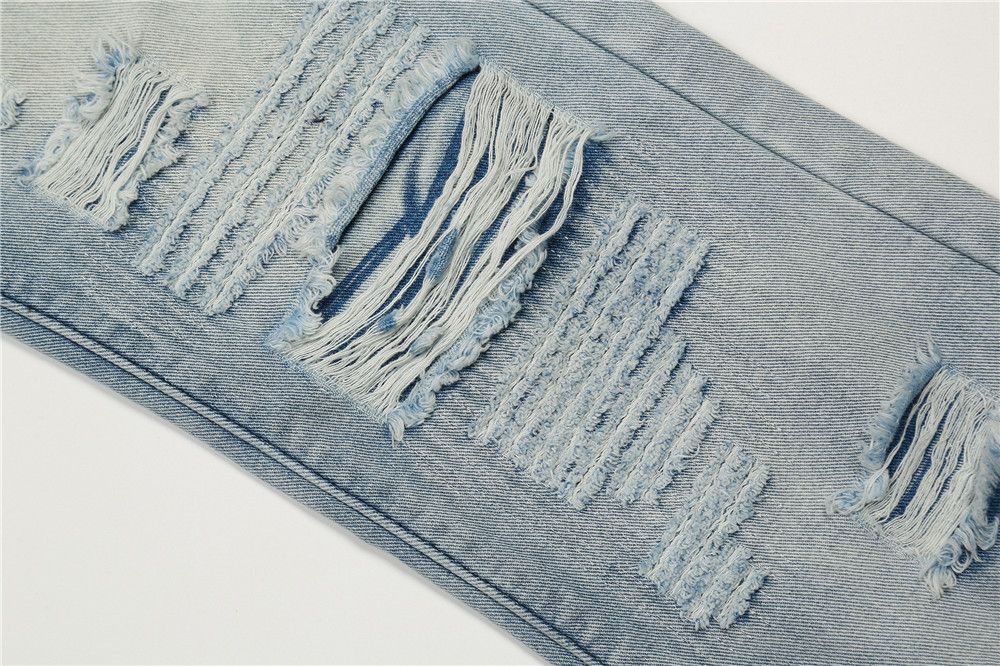 grunge damaged ripped washed flared jeans