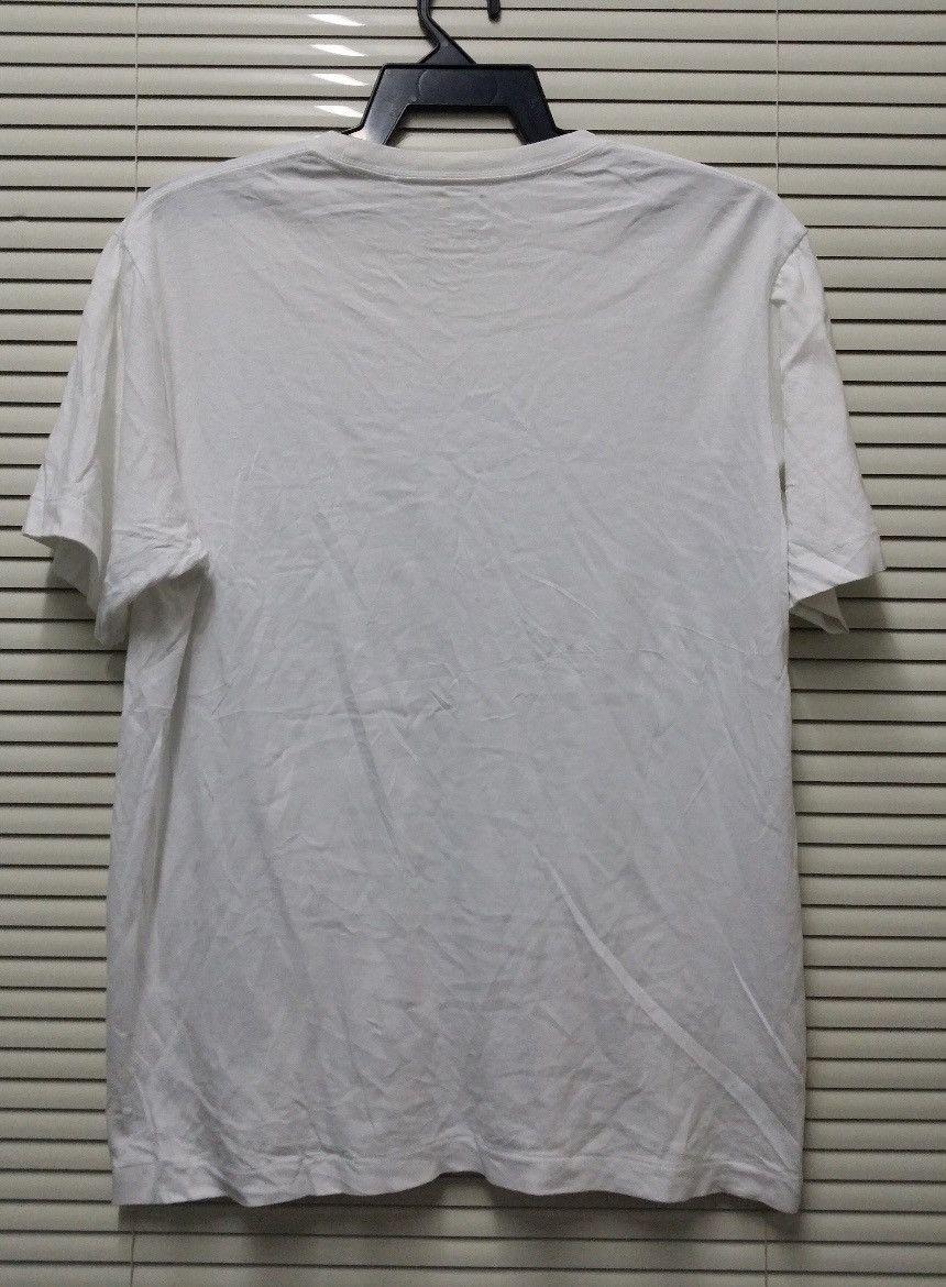 Kaws × Uniqlo KAWS X UNIQLO UT pocket tee shirt Size US M / EU 48-50 / 2 - 2 Thumbnail