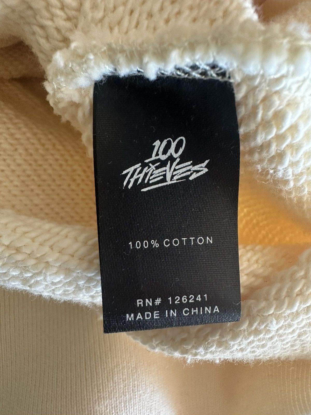 100 Thieves 100 Thieves Quarter Zip — Cream w/ Maroon Logo (L) Size US L / EU 52-54 / 3 - 7 Thumbnail