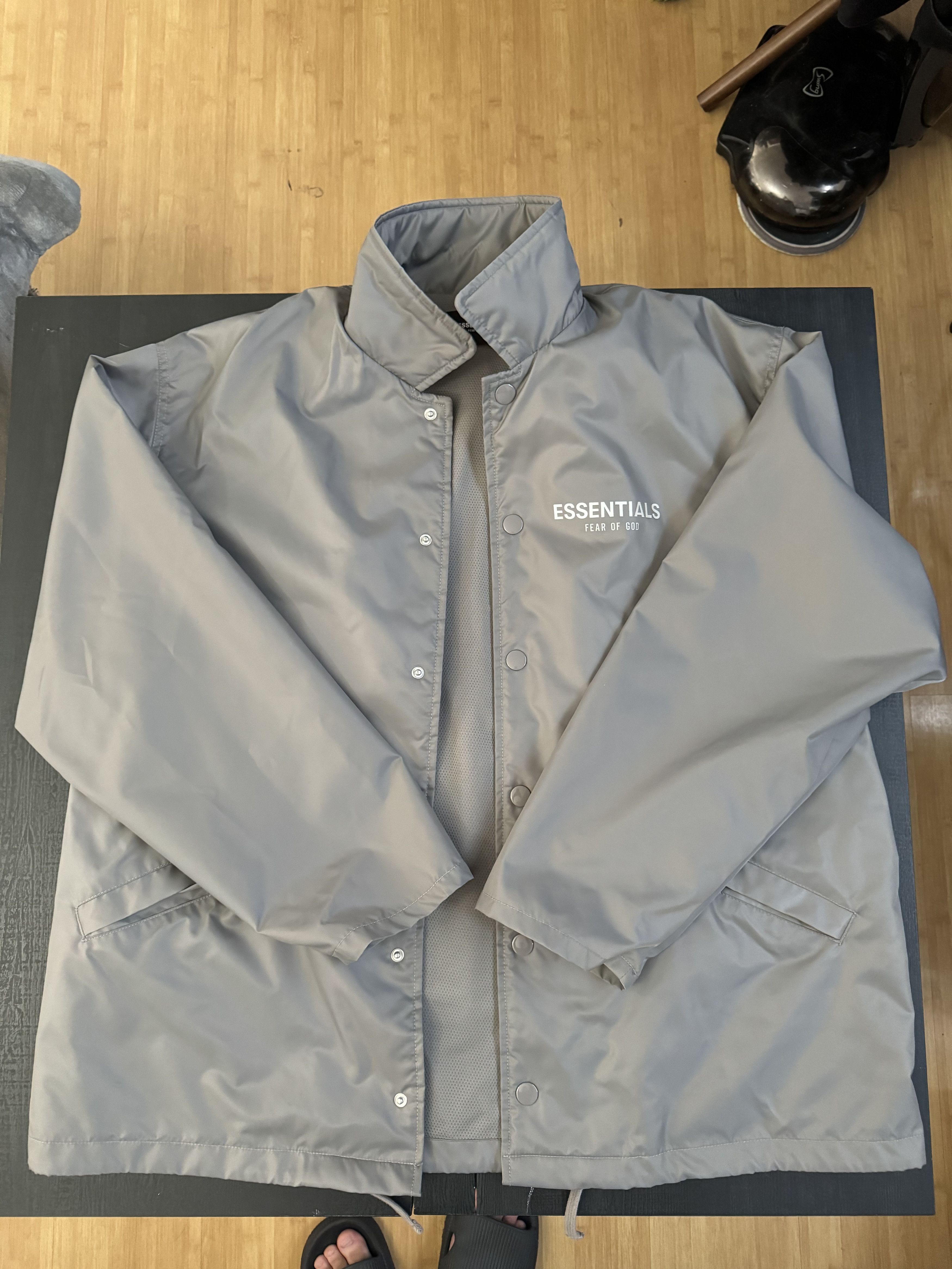 Fear of store god essentials coach jacket