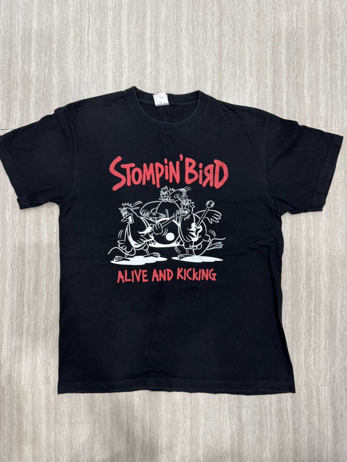 Band Tees Stompin’ Bird, Alive and Kicking black Shirt L size Size US L / EU 52-54 / 3 - 1 Thumbnail
