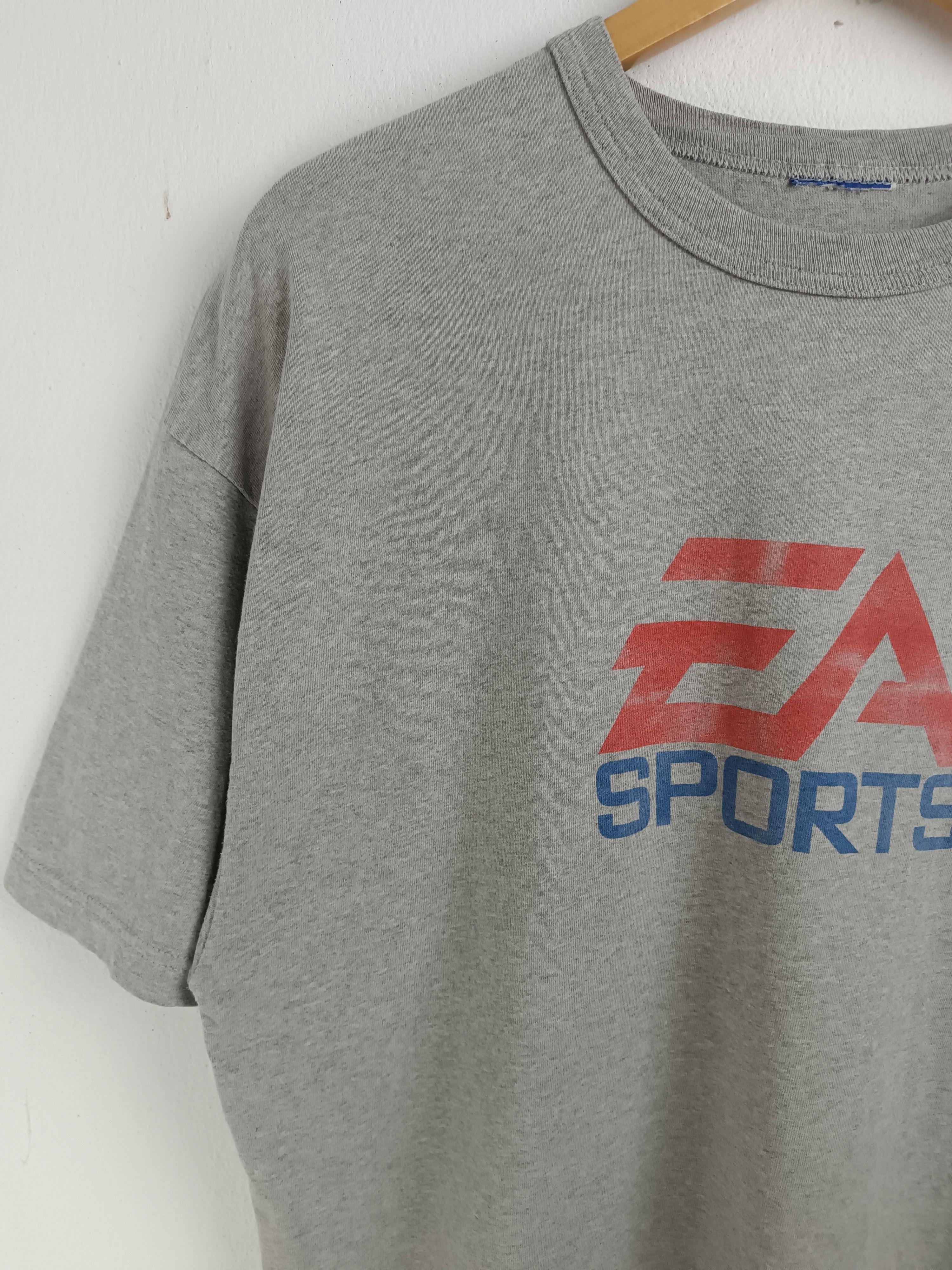 Champion VINTAGE Y2K EA SPORTS CHAMPION GAME FIFA 2K NBA VERY RARE Ts Size US XL / EU 56 / 4 - 5 Thumbnail