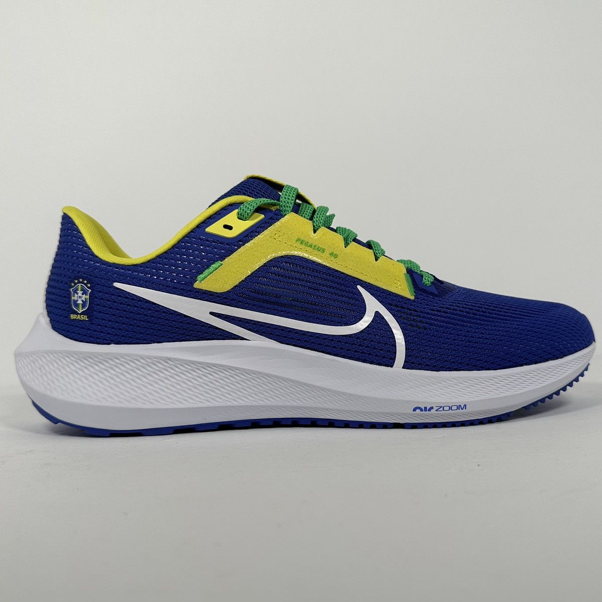 image of Nike Air Zoom Pegasus 40 Brazil Soccer Size 9.5 Shoes in Blue/Yellow, Men's