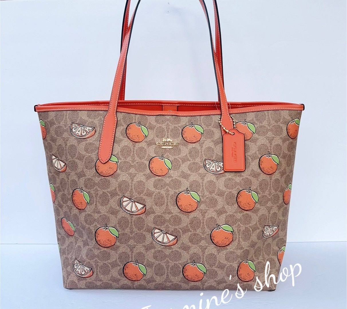 トートバッグ COACH City Tote Bag CAL64 CAL74 CAL76 Coach City Tote Bag In Signature Canvas With Orange Print