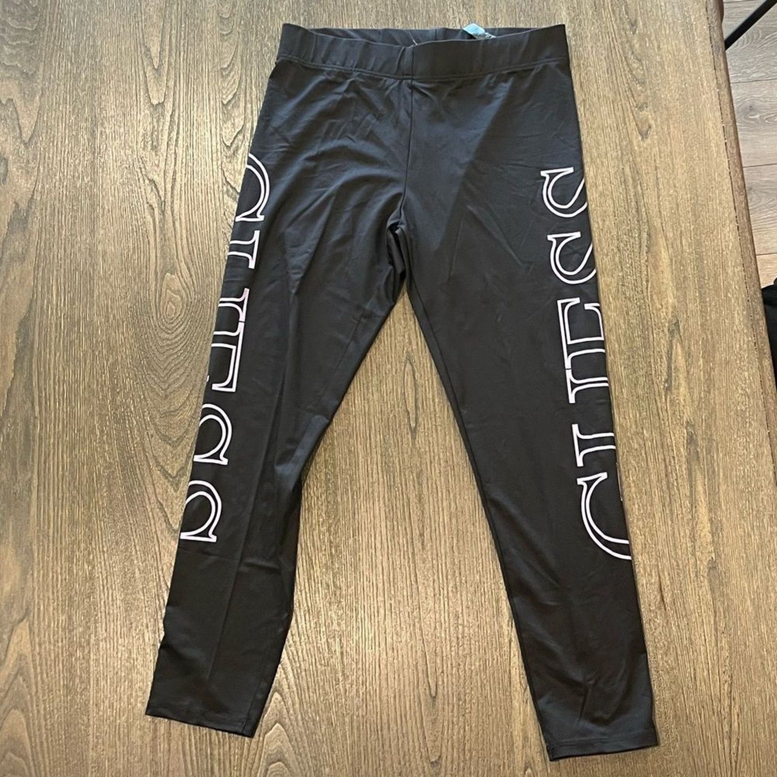 Guess NWOT Guess Black Cropped Capri Leggings Logo Print Size L Size 31" - 1 Thumbnail