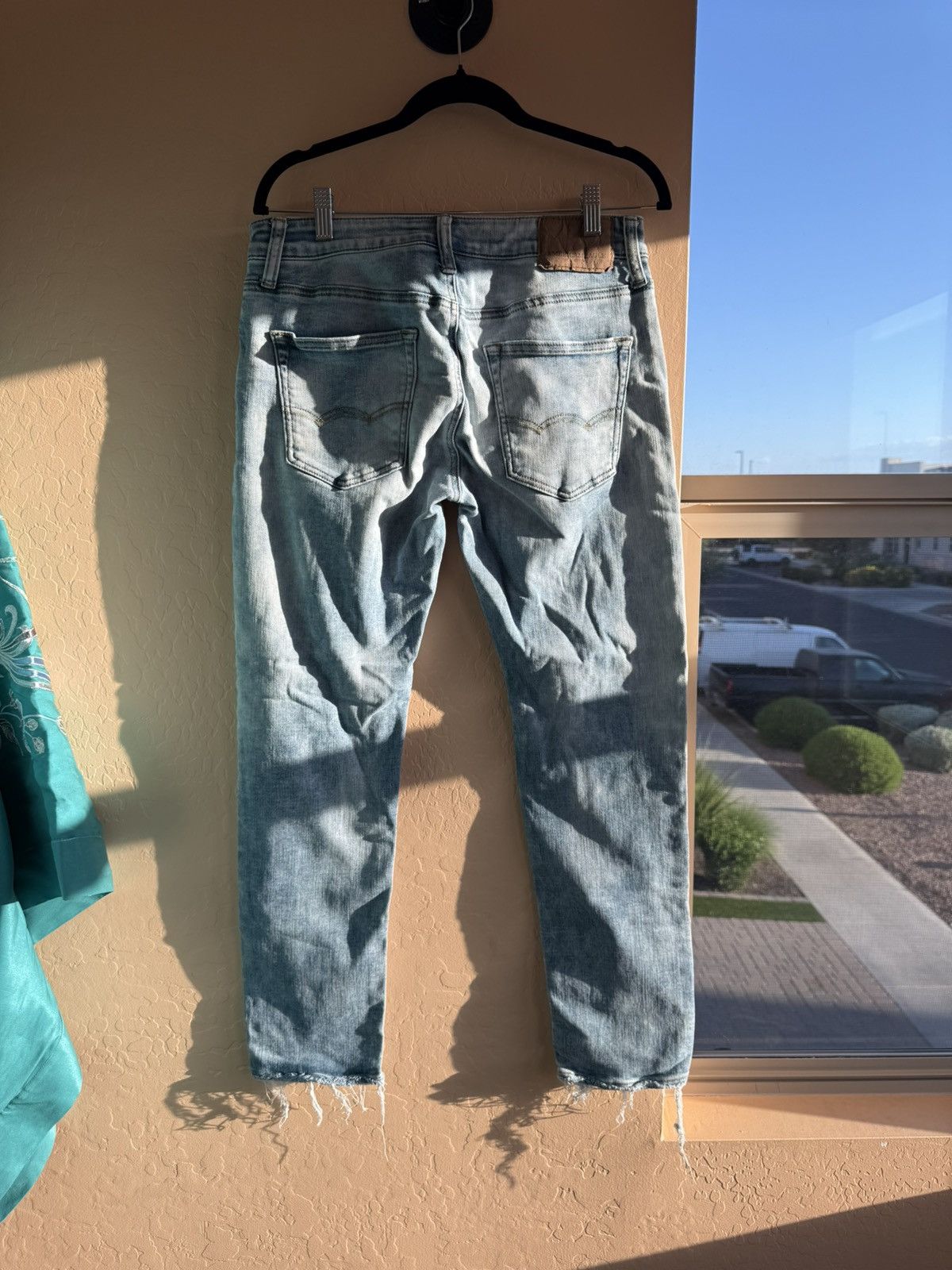 American Eagle Outfitters American Eagle Light Wash Distressed Hem Jeans - Size 29 Size US 29 - 4 Thumbnail