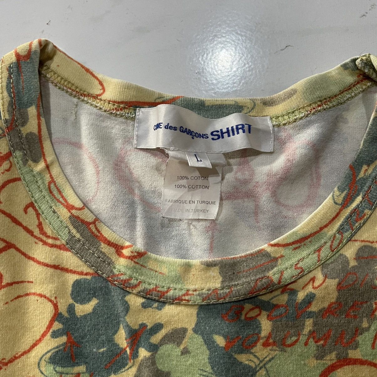 Comme des garcons disney all over print tee
