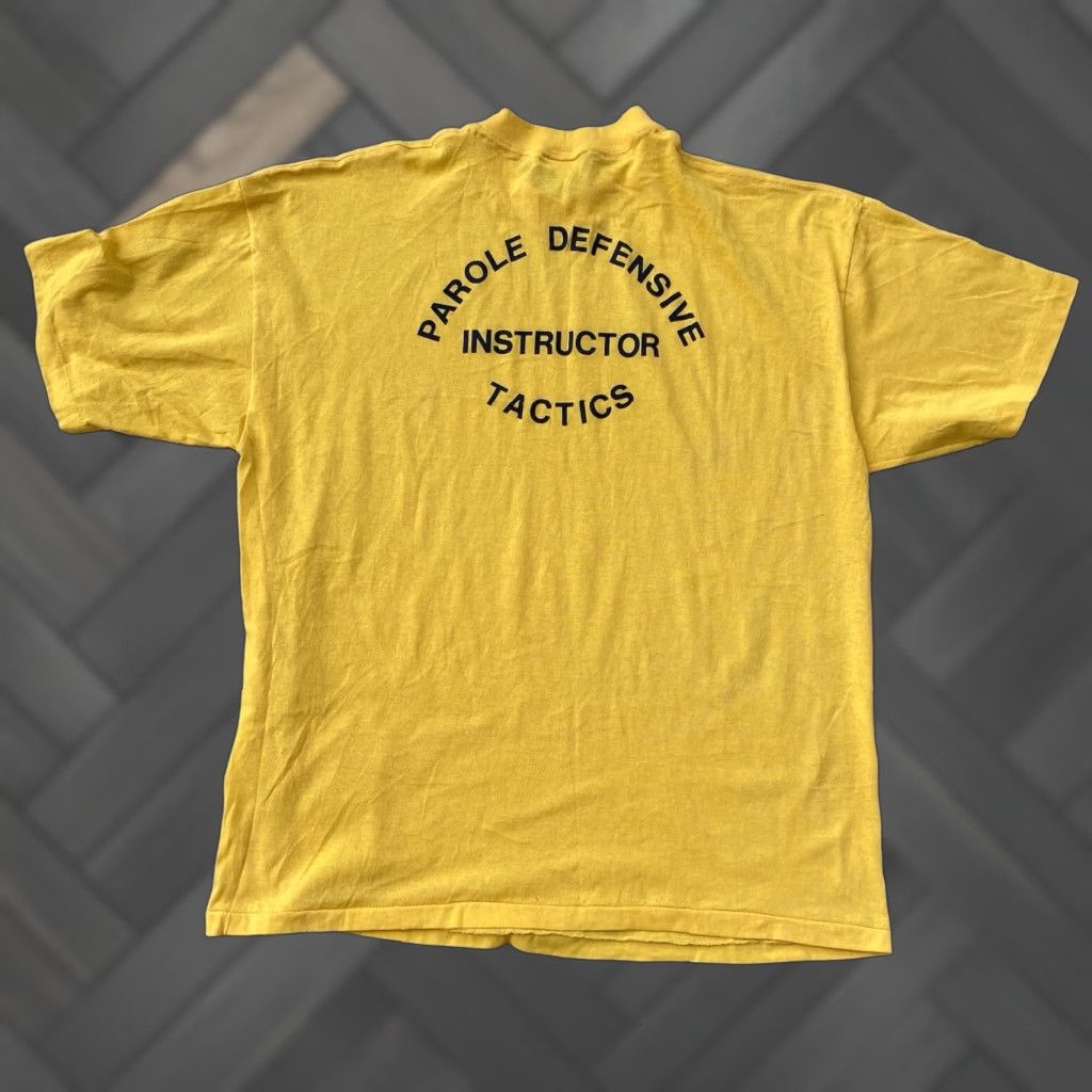 Vintage VINTAGE Parole Defensive Tactics Instructor T Shirt Short Sleeve Size XXXL 3XL Yellow Touch Of Gold Mens Shirt 1980s Graphic Print Size US XXL / EU 58 / 5 - 1 Thumbnail