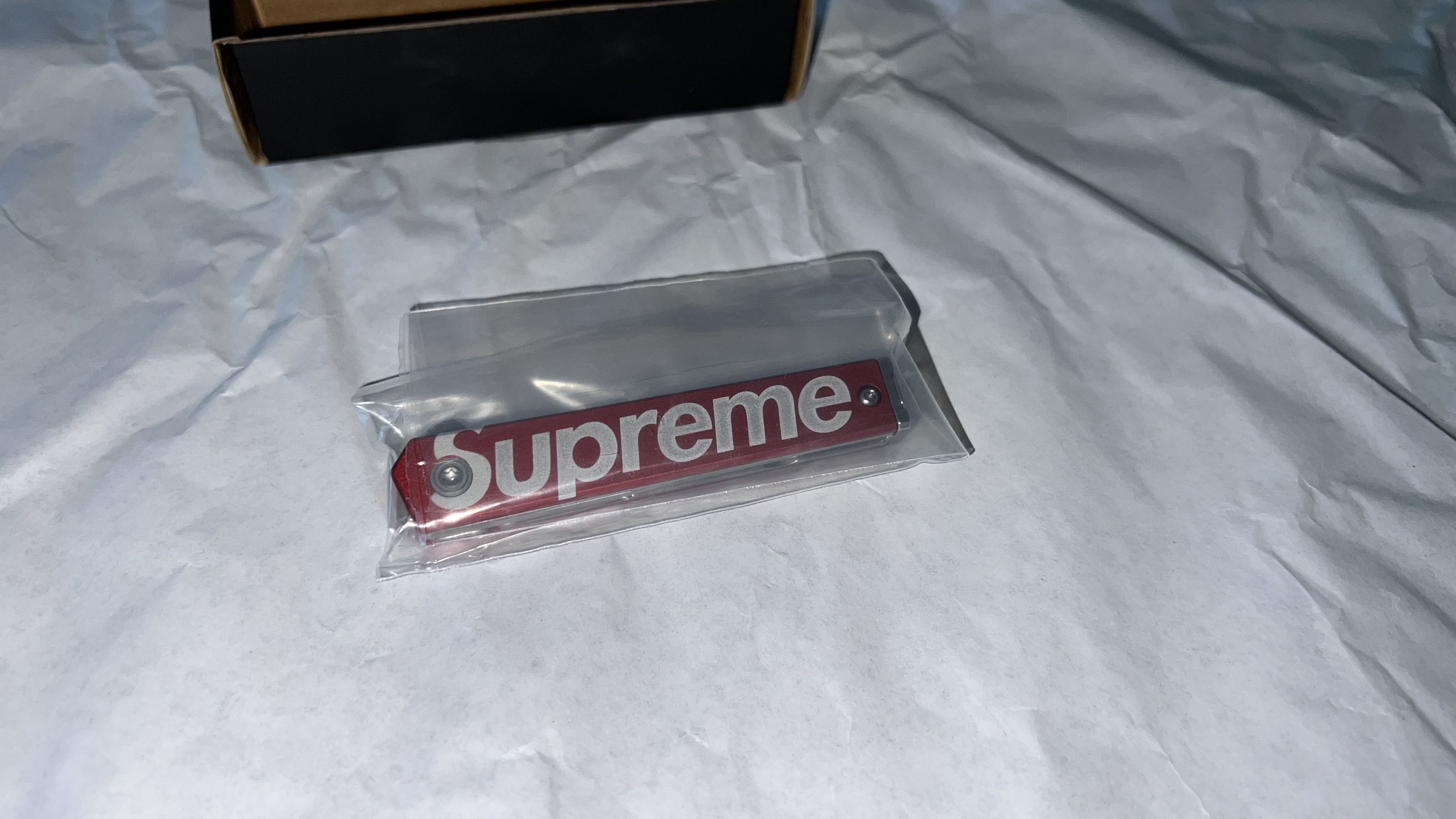 image of Supreme Crkt Ceo Microflipper Pocket Knife in Red, Men's