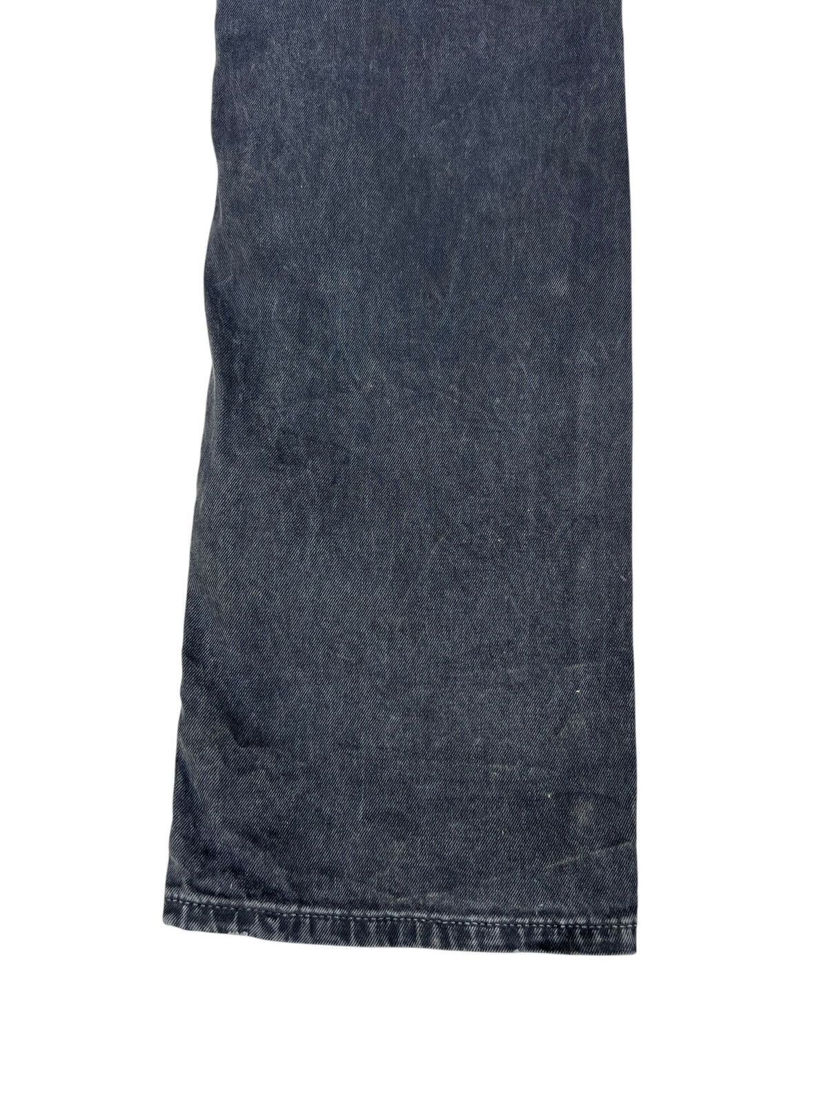 Distressed Prada Waxed Jeans