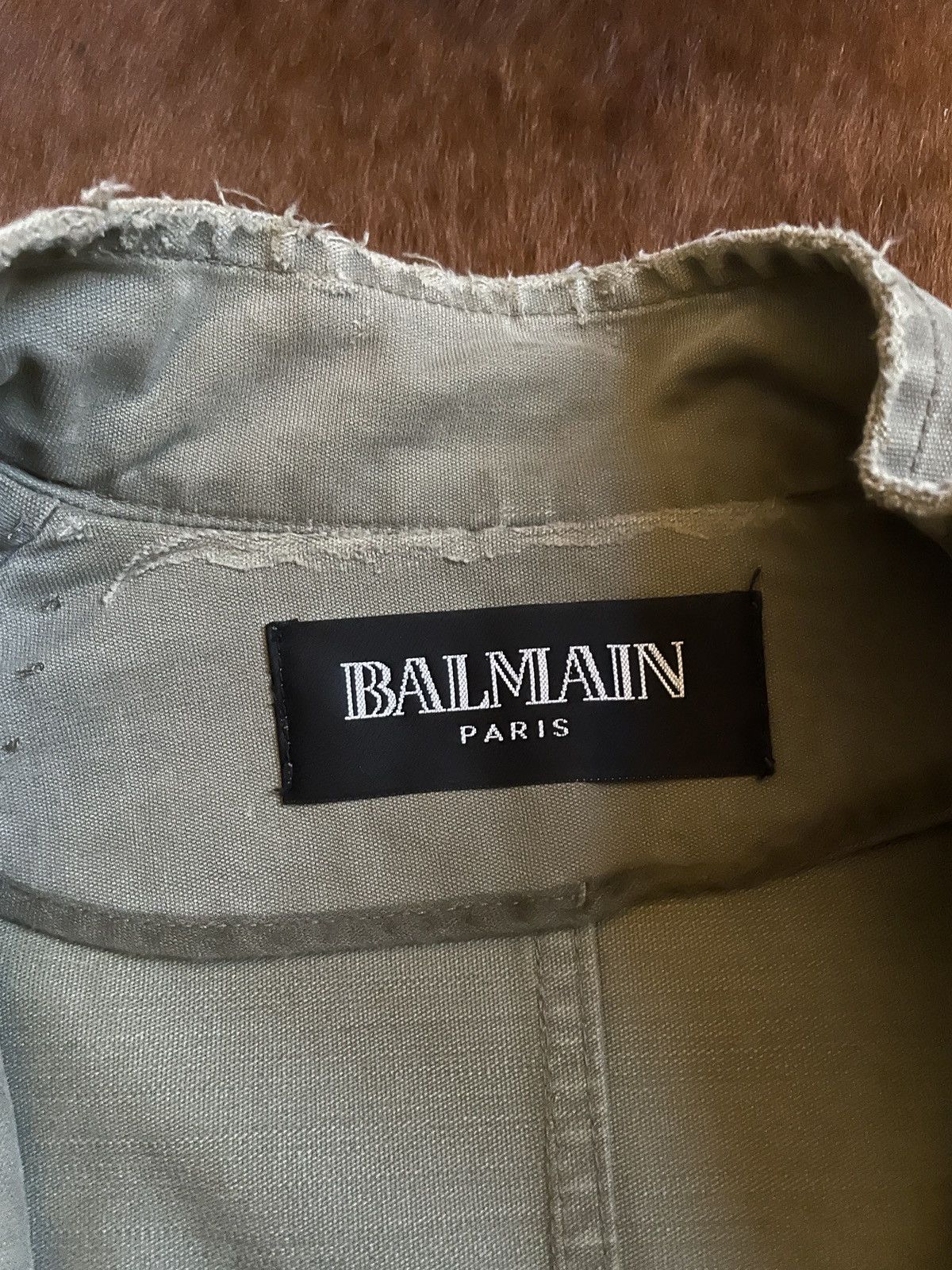 BALMAIN SS10 runway look Decarnin military coat