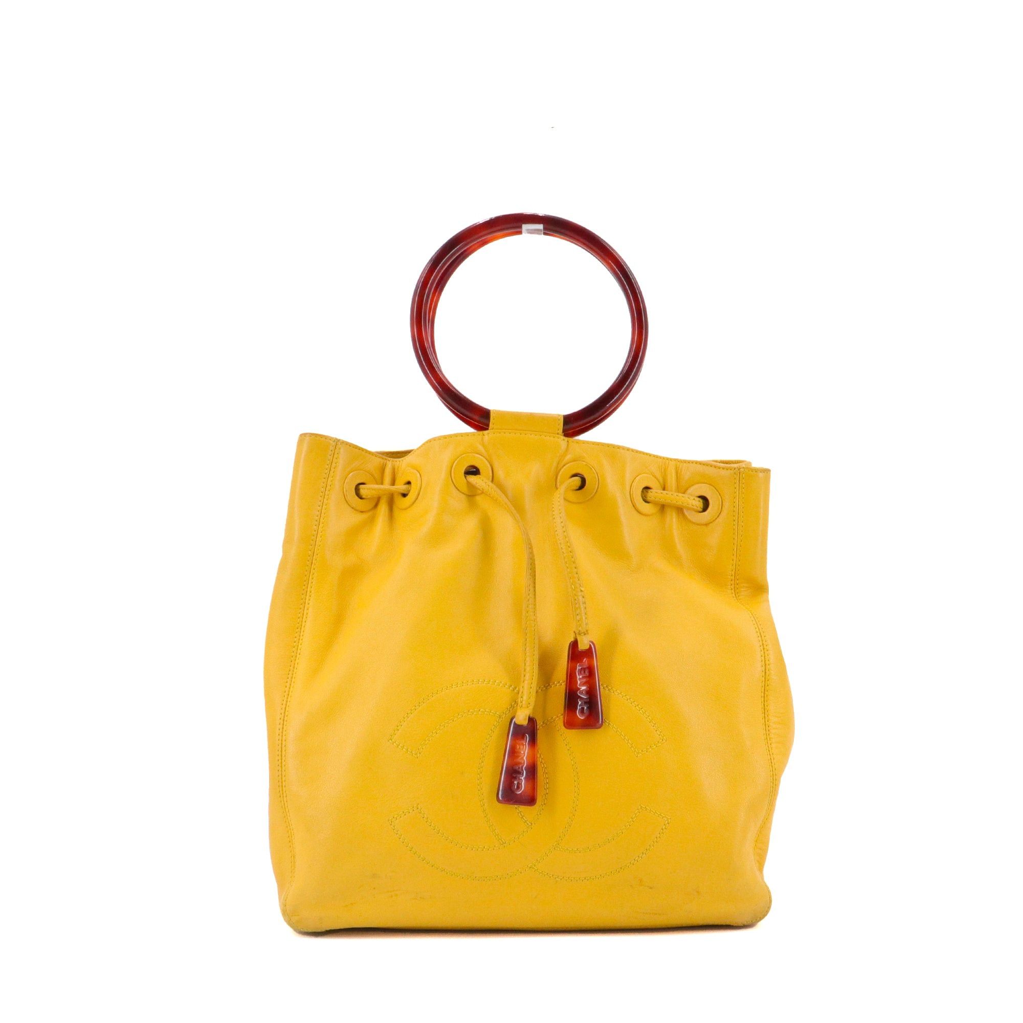 Chanel CHANEL - Chanel Drawstring Ring Handle handbag in yellow leather Size ONE SIZE - 1 Thumbnail