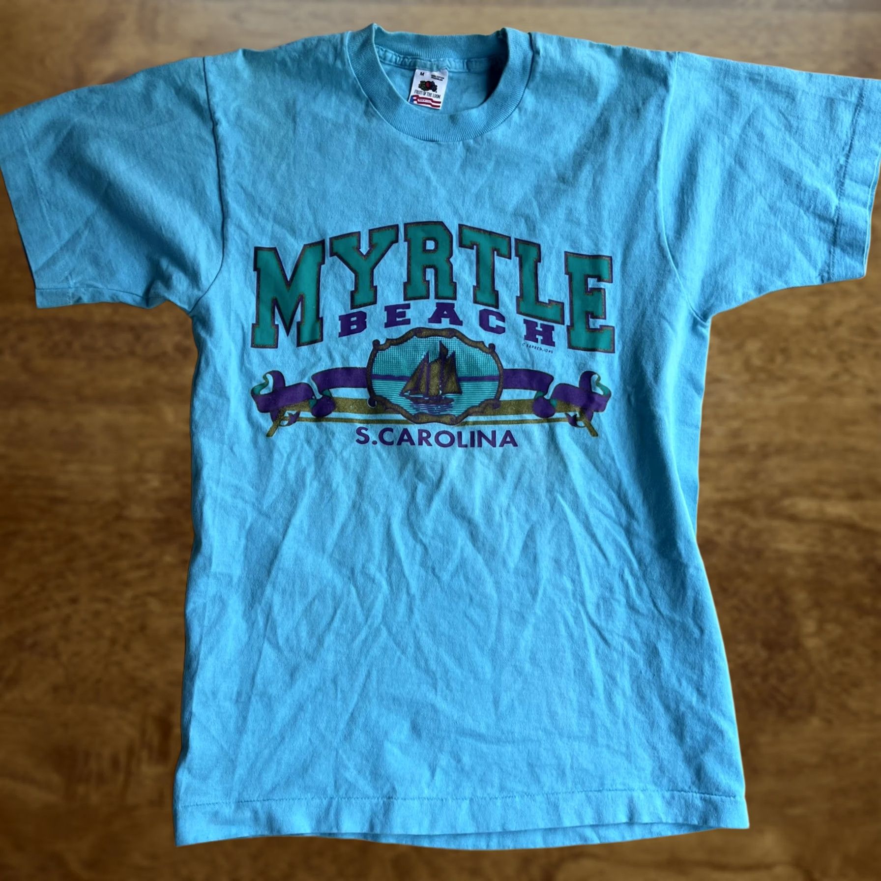 Fruit Of The Loom VINTAGE Fruit Of The Loom T-Shirt Mens Medium Myrtle Beach S. Carolina Graphic Print Crew Neck Short Sleeve USA Blue Turquoise Back Plain Front Size US M / EU 48-50 / 2 - 1 Thumbnail