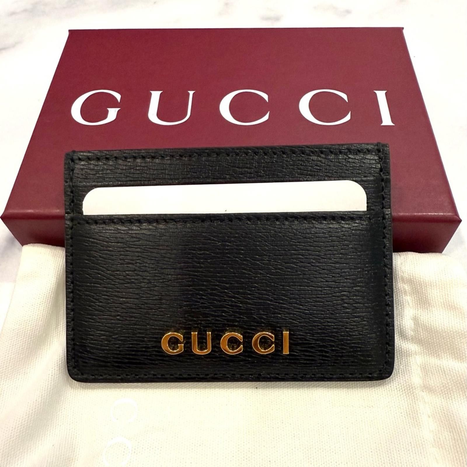 Gucci Gucci Black and Gold Card Holder Size ONE SIZE - 1 Thumbnail