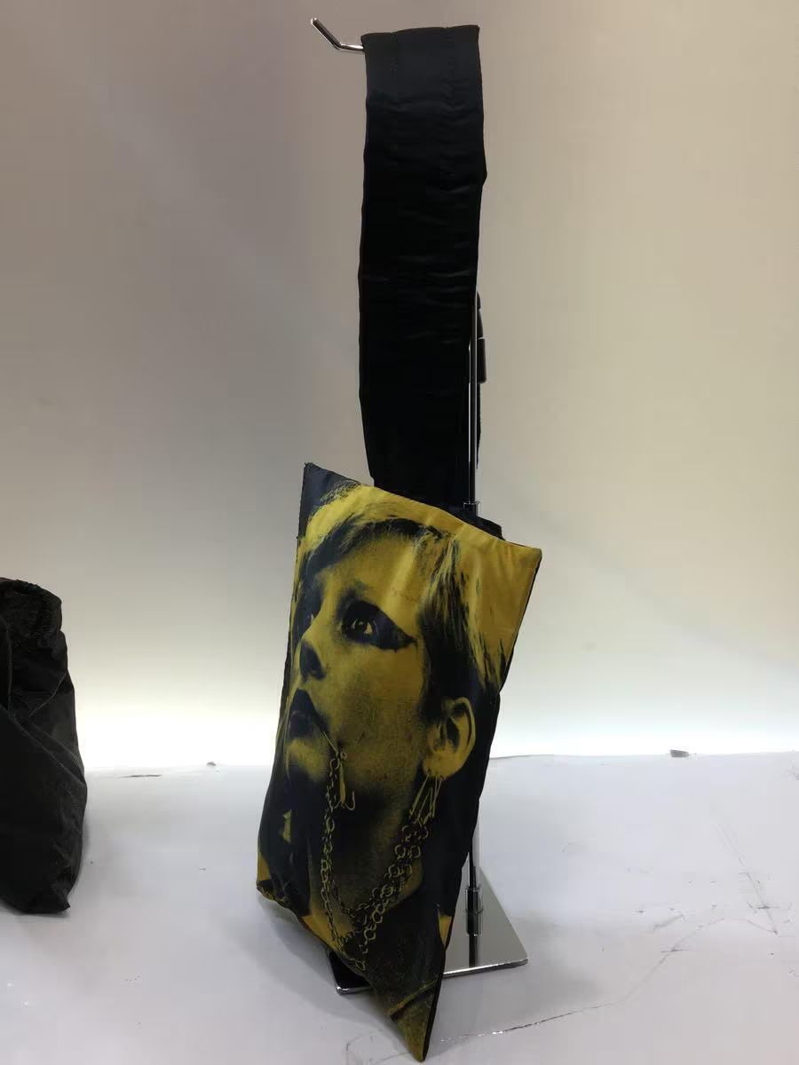 image of Eastpak x Raf Simons Poster Shoulder Bag in Yellow, Men's