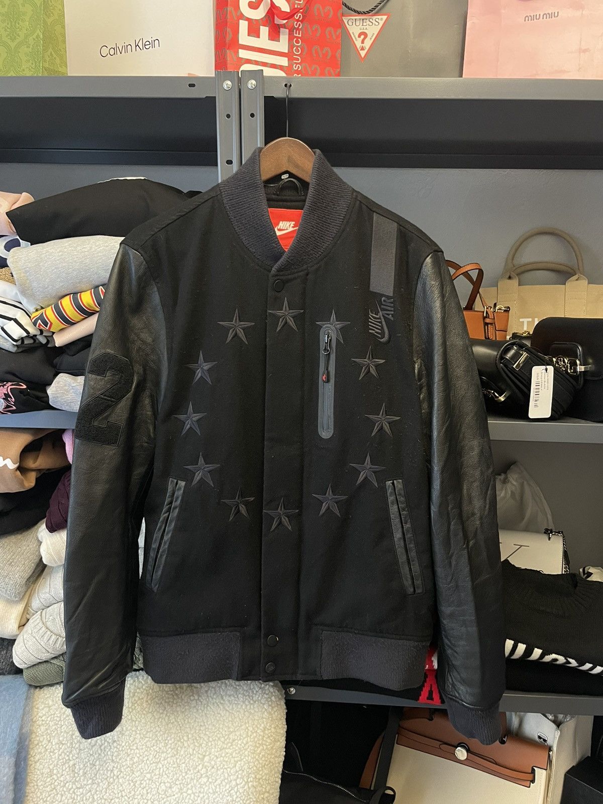 image of Nike Destroyer Wool Leather Varsity Bomber Jacket in Black, Men's (Size Medium)