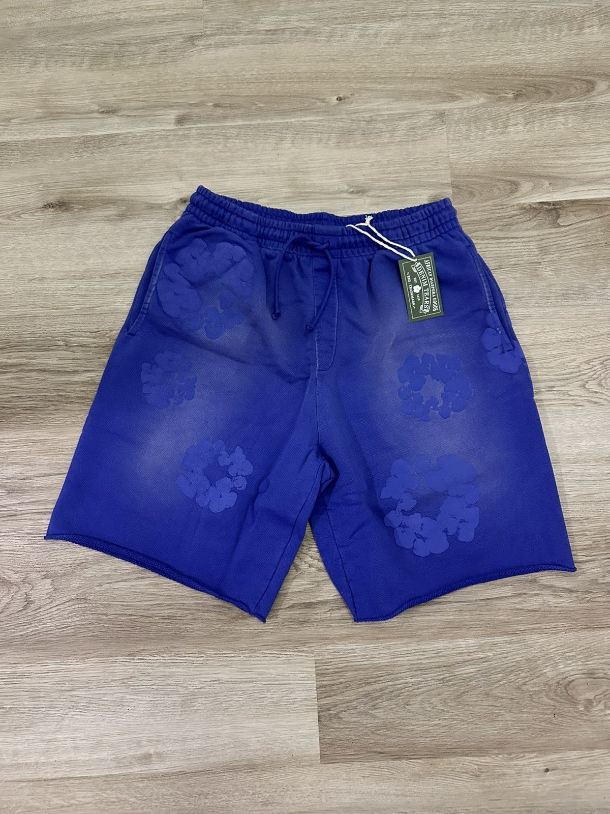 DENIM TEARS Denim Tears Cotton Wreath Blue Sweat Shorts | Grailed