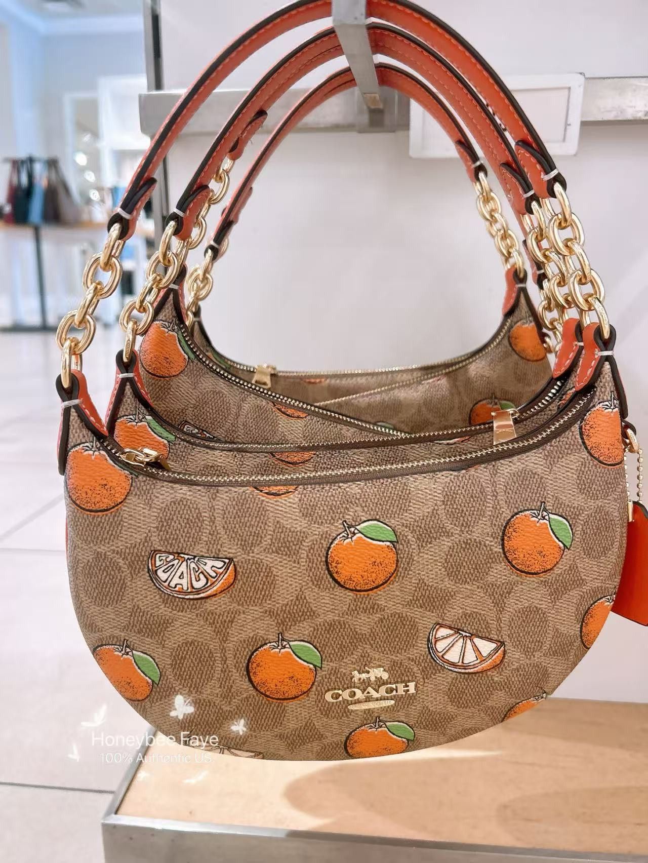 COACH◇Mini Payton ショルダーバッグ オレンジ CBA78 Coach Mini Payton Bag In Signature Canvas With Orange Print