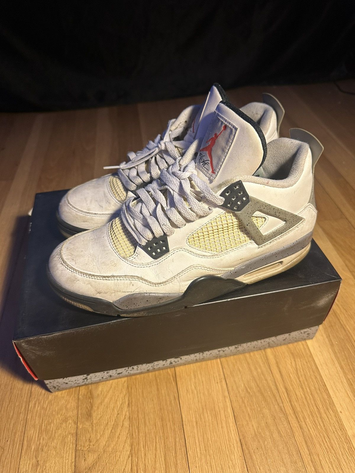 image of Air Jordan Retro 4 “Cement” Shoes in White, Men's (Size 9)
