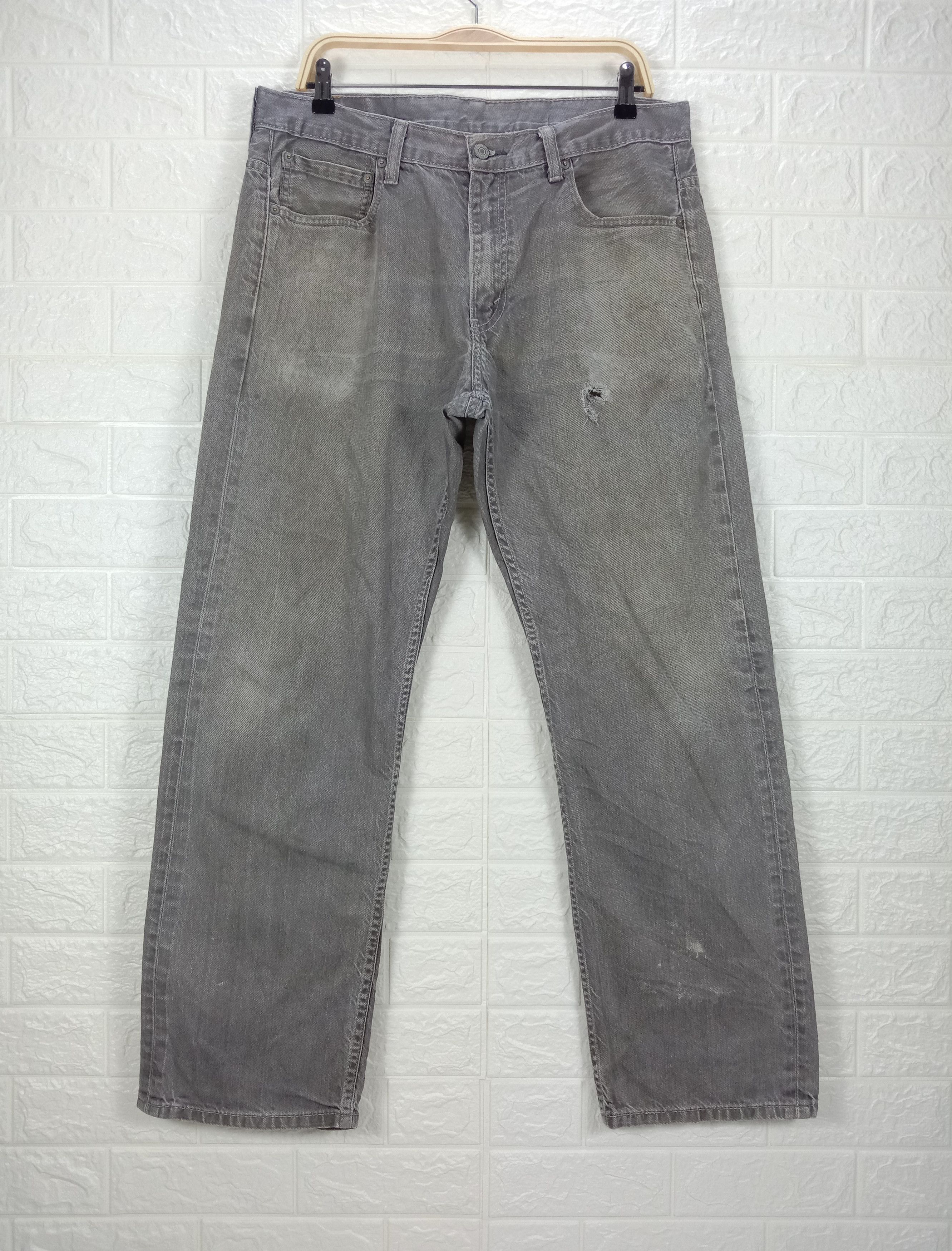 image of Vintage Levi's 569 Jeans Loose Straight Fit Distressed Denim in Grey, Men's (Size 34)