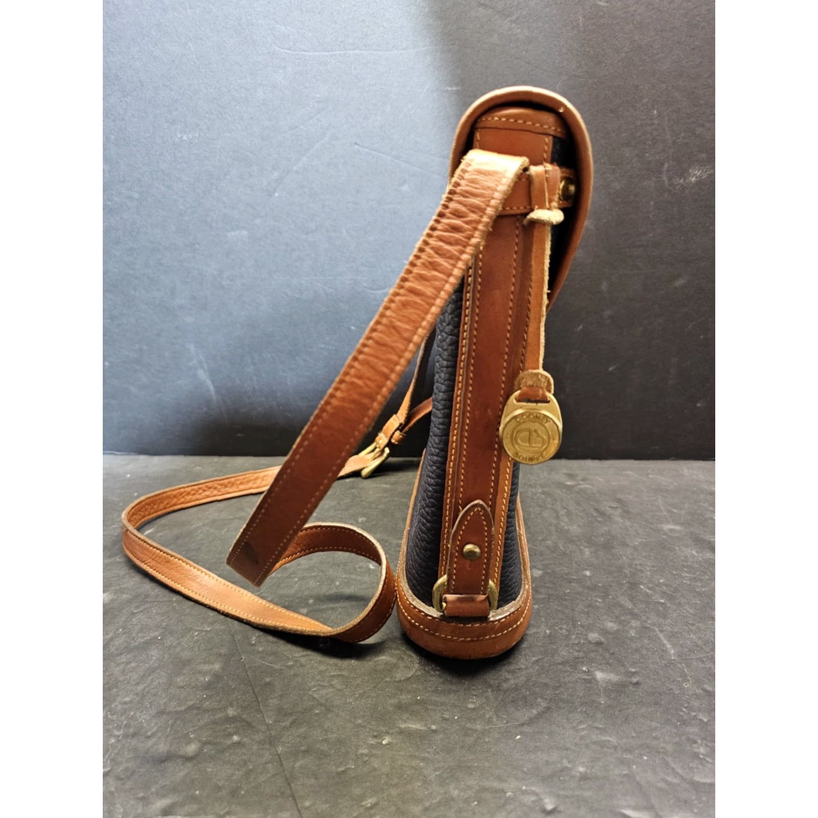 Dooney & Bourke VINTAGE Dooney & Bourke All Weather Leather Pebbled Finish Spectator Bag Navy Blue Bucket Bag Women Medium Brown Leather Strap 11" Gold Hardware Size ONE SIZE - 6 Thumbnail