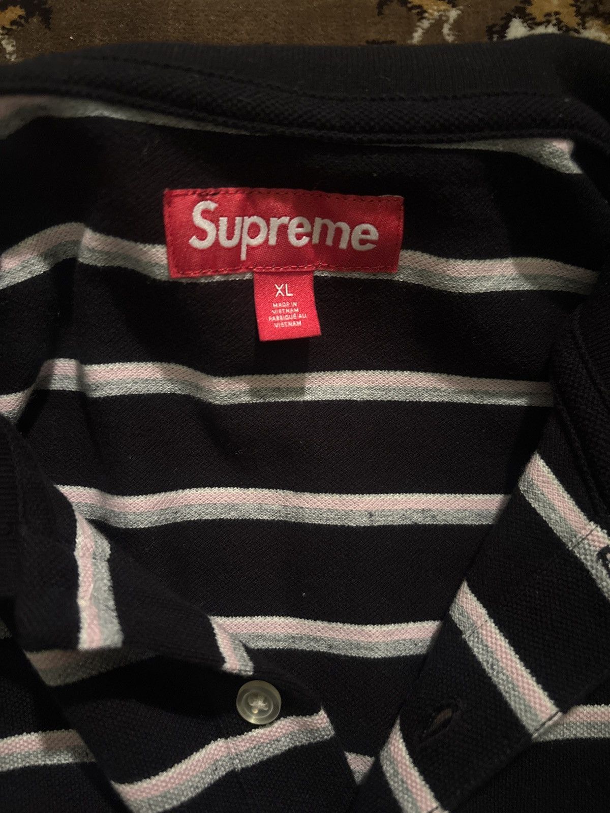 Supreme washed black striped polo ss26