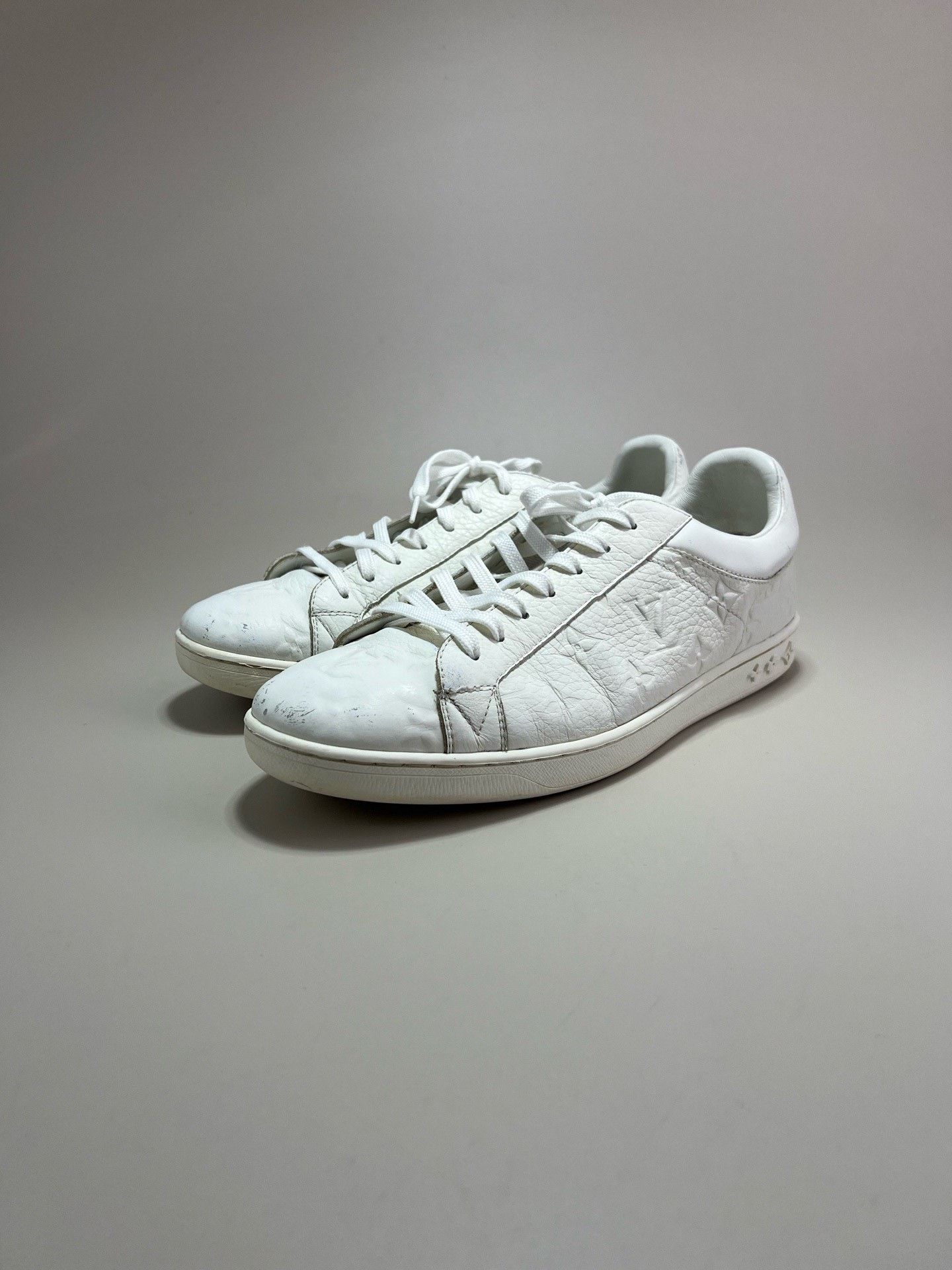 Louis Vuitton Louis Vuitton White Embossed Logo Low-top Sneakers Size US 9 / EU 42 - 1 Thumbnail