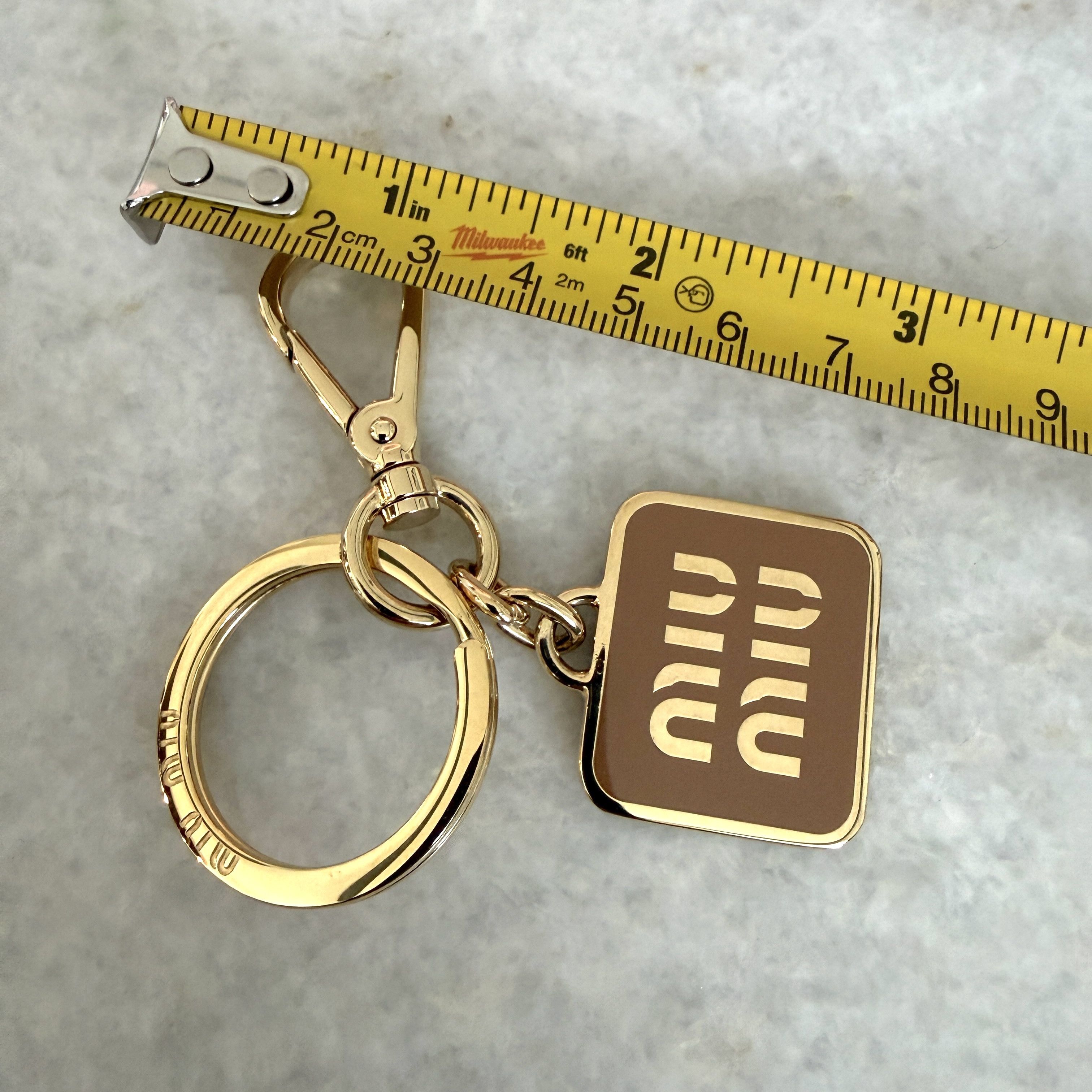 Miu Miu Miu Miu 5PS066 Metal Key Chain Logo, gold and caramel in box Size ONE SIZE - 7 Thumbnail