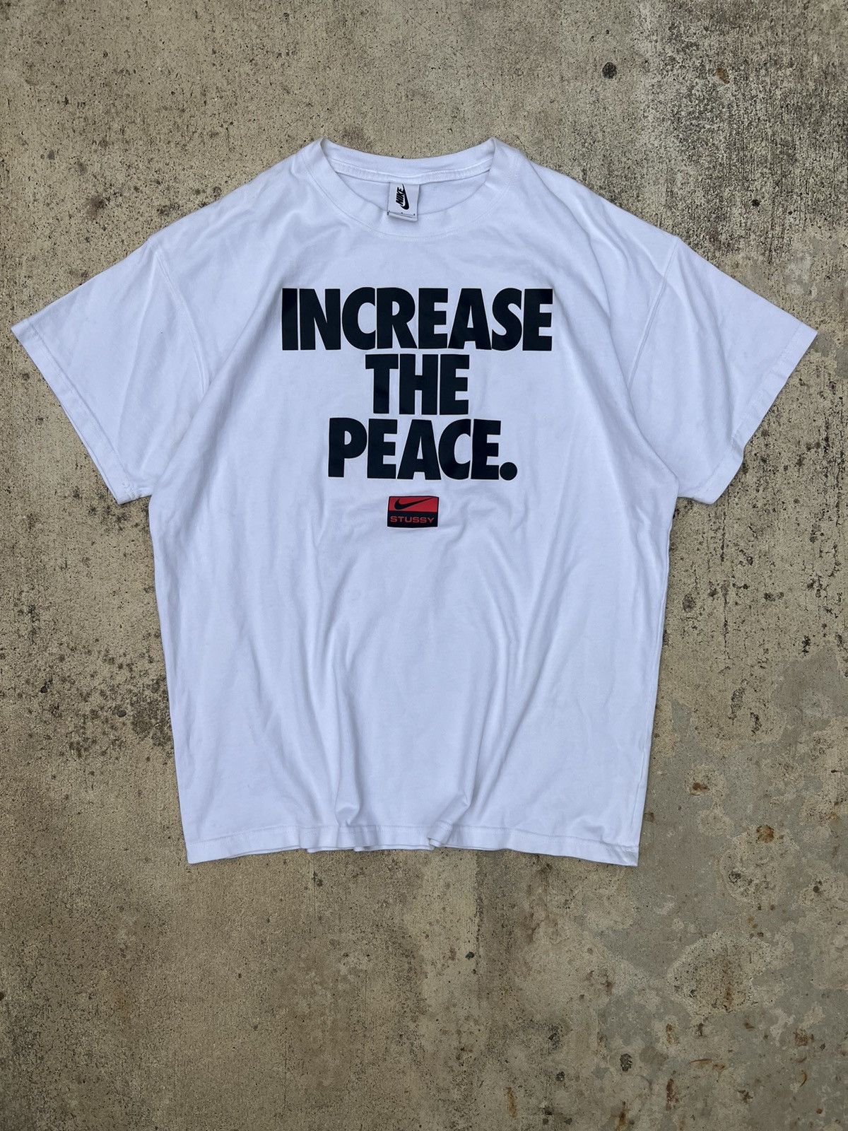 increase the peace stussy nike