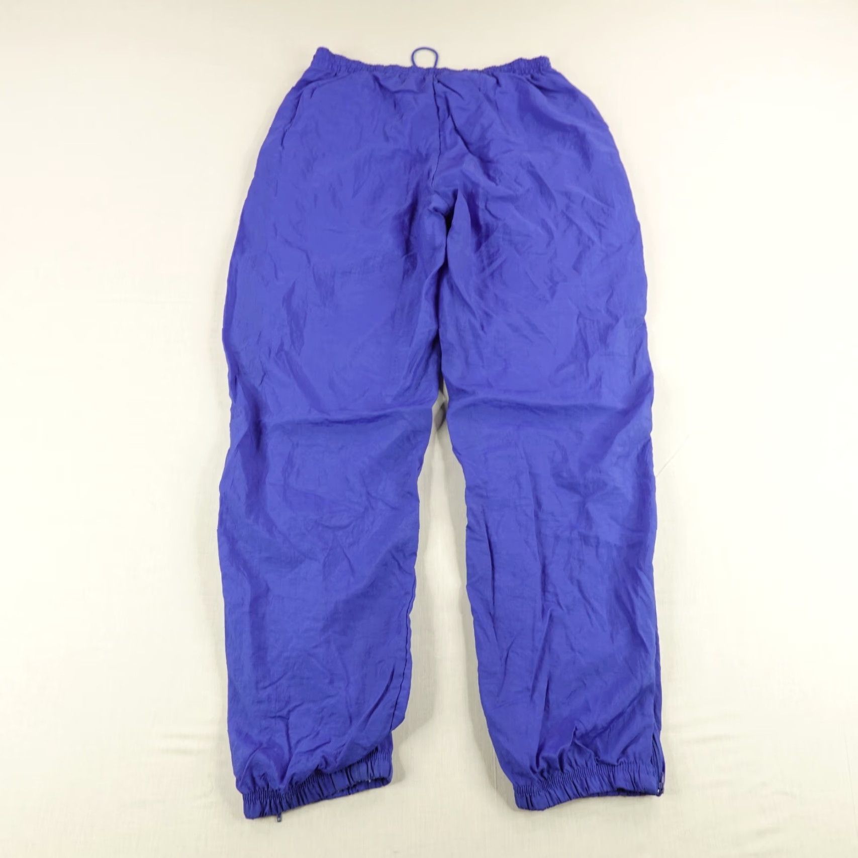 Reebok Vintage Reebok Pants Large Blue Windbreaker Track Pants Ankle Zip Lined 90s joggers ensemble? Size US 31 - 7 Thumbnail