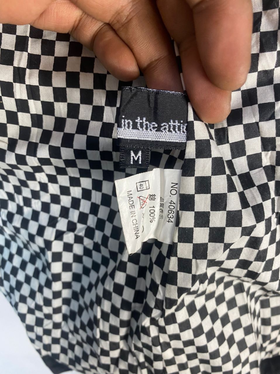 In the attic button black jacket