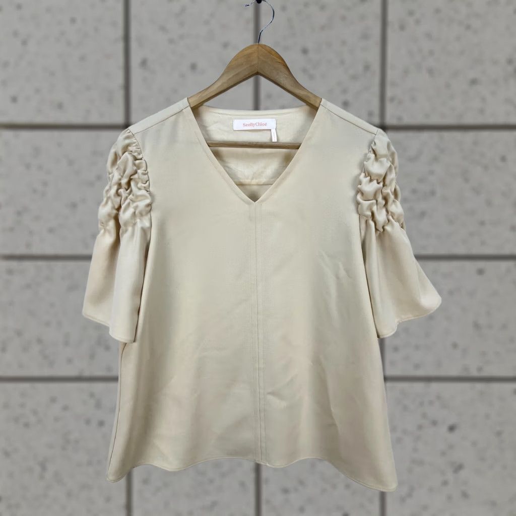 Vintage See By Chloe Beige V-Neck Blouse Ruched Short Sleeve Women’s Size 42 L Beige Blouse Womens V-Neck Short Sleeve See By Chloe Size L / US 10 / IT 46 - 1 Thumbnail