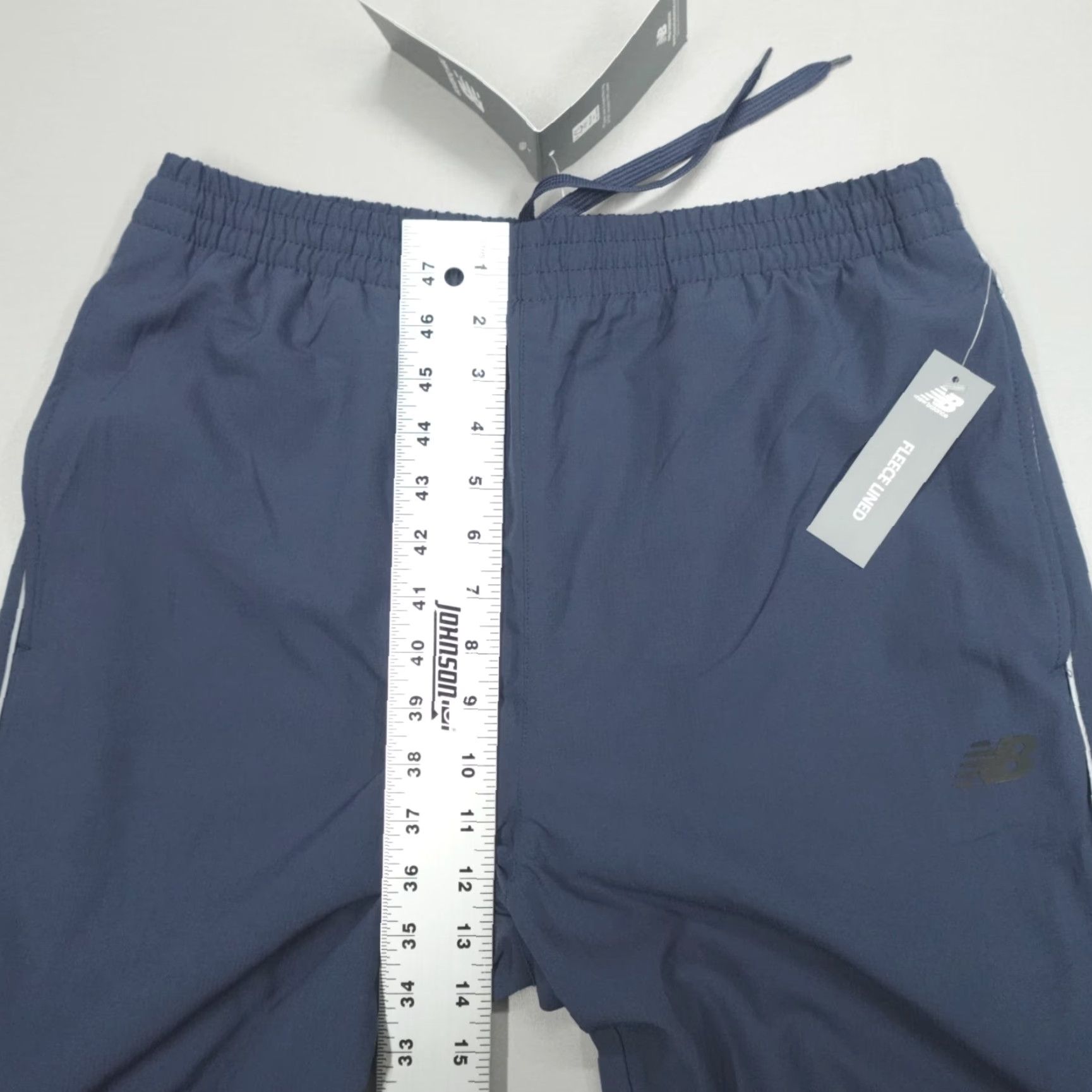 New Balance New Balance Pants Men's Size M Blue Fleece Lined Stretch Woven Adjustable Hem Waist Drawstring Comfort Pockets Regular Inseam 30" Running Shirt? Size US 31 - 7 Thumbnail