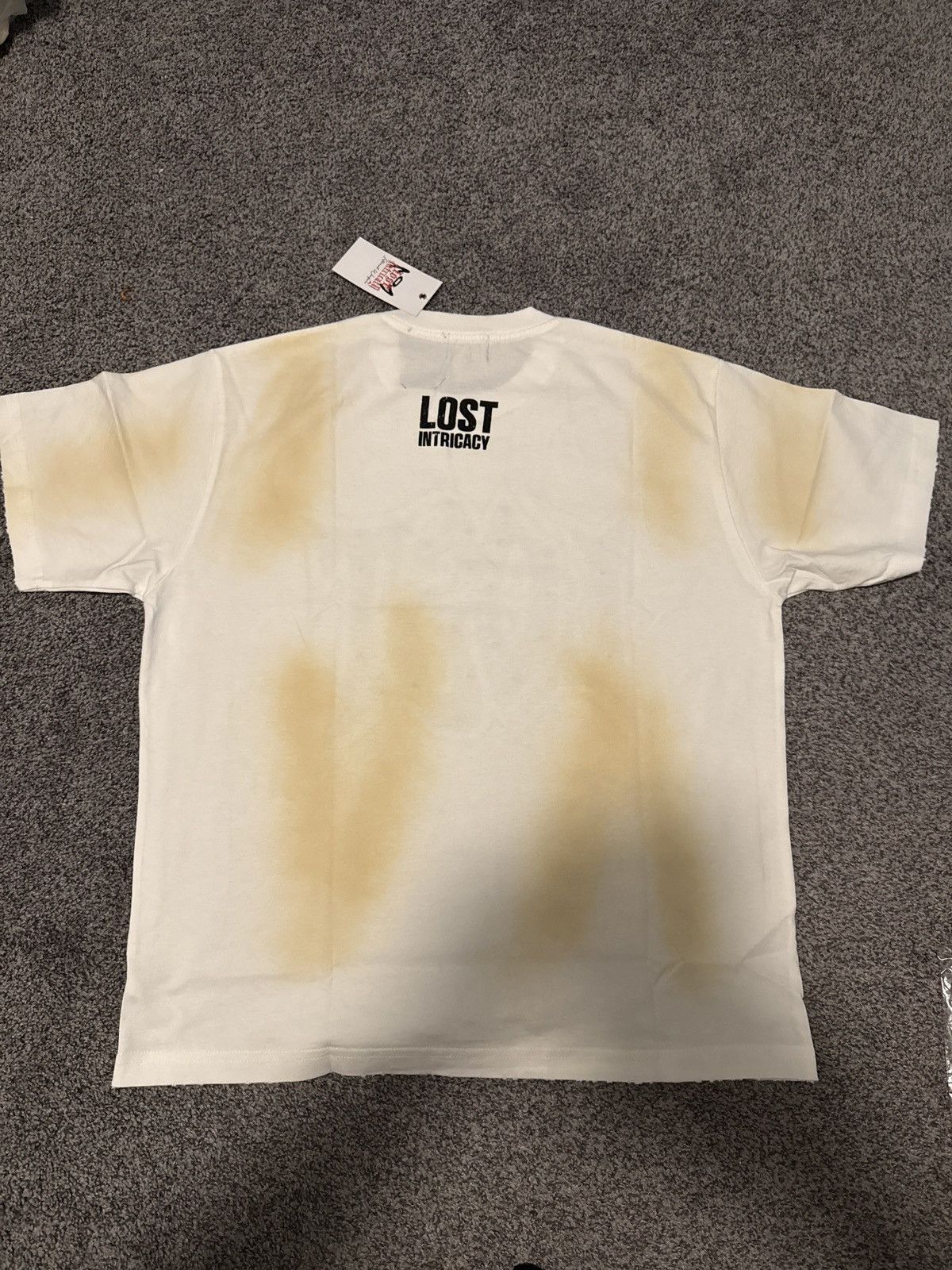 LOST INTRICACY Lost Intricacy - size small - for a steal! Size US S / EU 44-46 / 1 - 2 Thumbnail