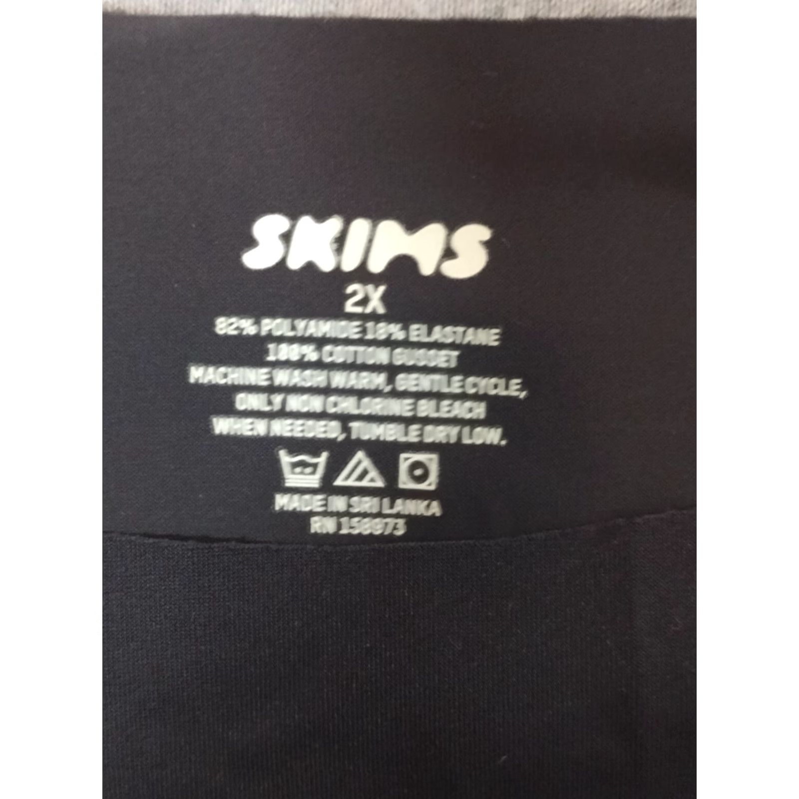 SKIMS **SKIMS Opaque Foil Thong Underwear Size 2X Onyx** User: **SKIMS Foil Opaque Thong Underwear Size 2X Onyx** Size ONE SIZE - 4 Thumbnail