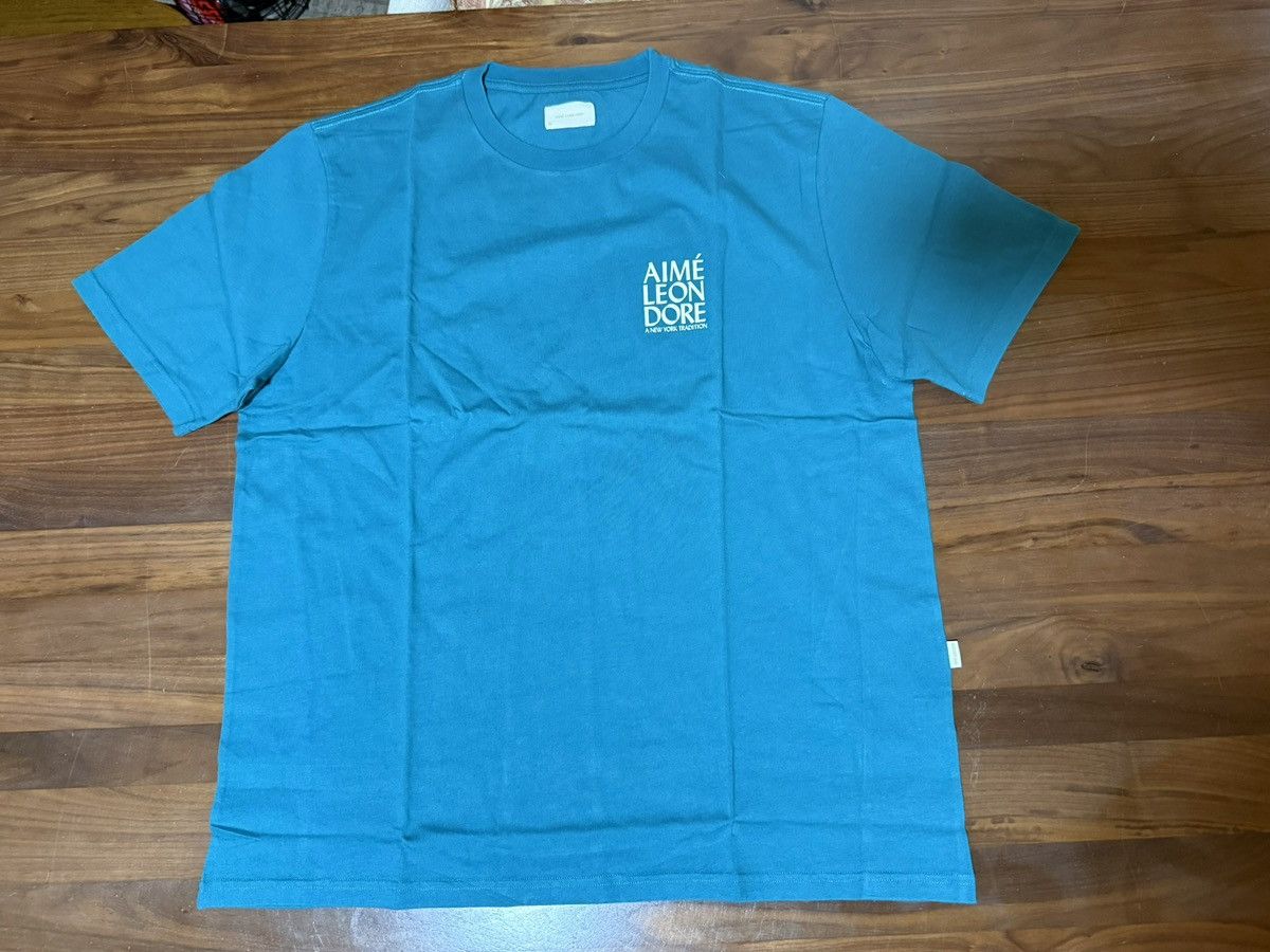 Aime Leon Dore Aime Leon Dore ALD Swimmers Tee “Kayaking” (Teal) Size XL Size US XL / EU 56 / 4 - 5 Thumbnail