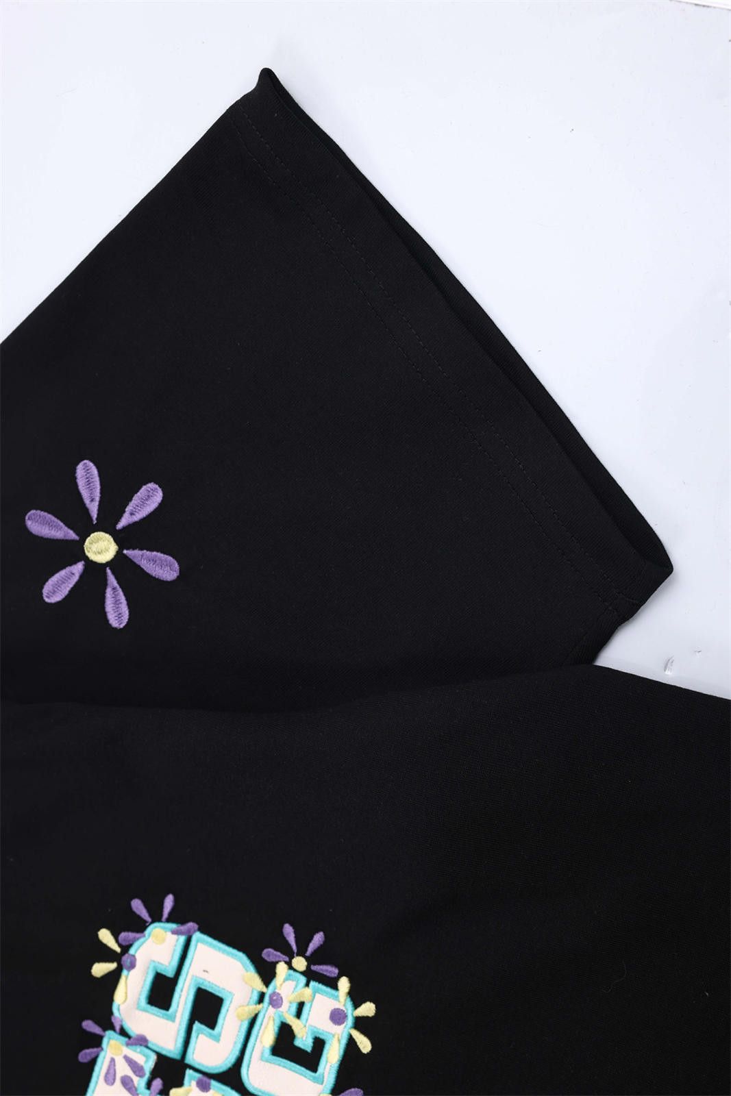 Vintage Stylish Black Graphic Tee with Floral Accents Size US M / EU 48-50 / 2 - 8 Thumbnail
