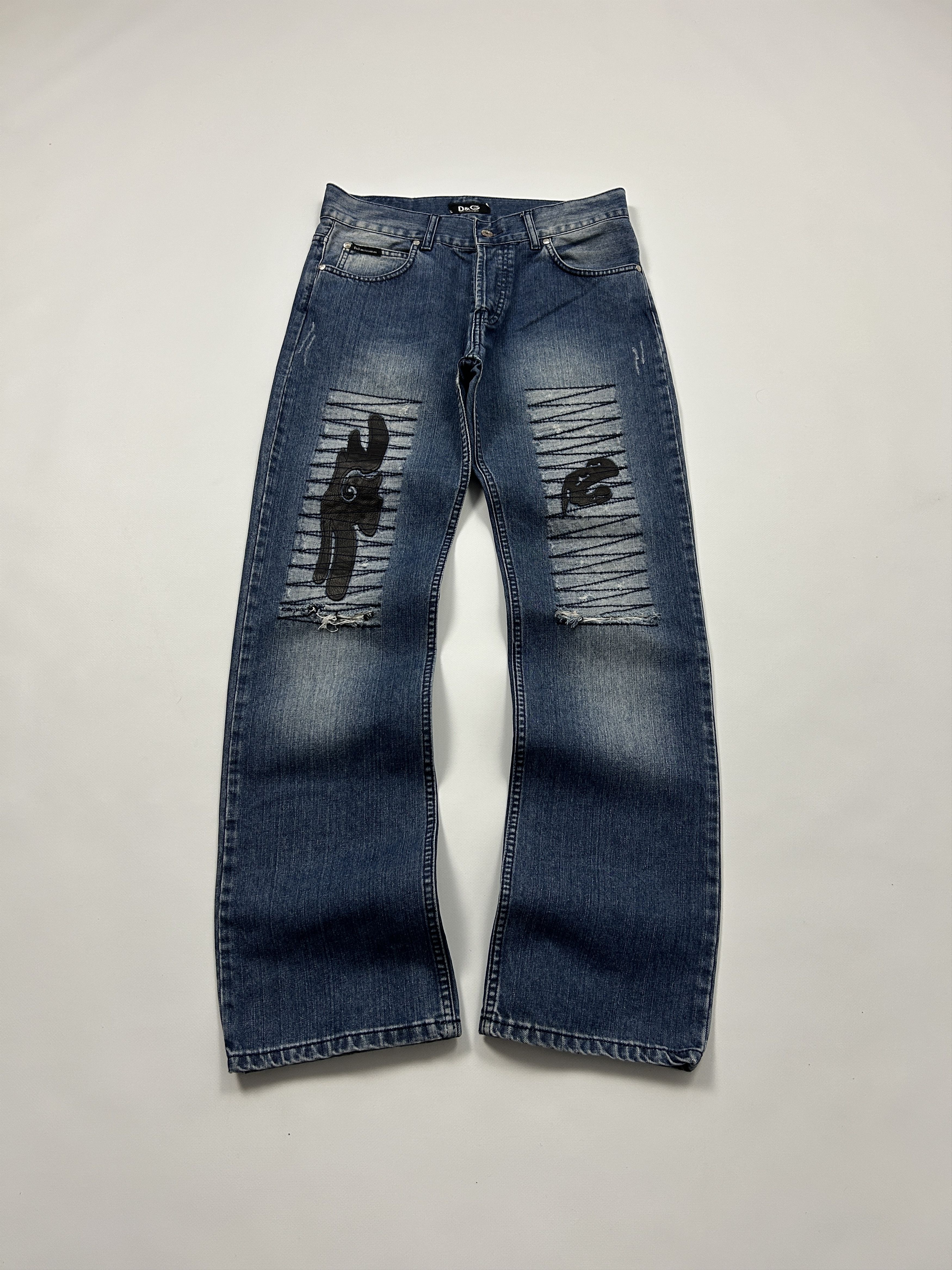 Dolce & Gabbana 2000s eyelet studded bondage holed jeans denim