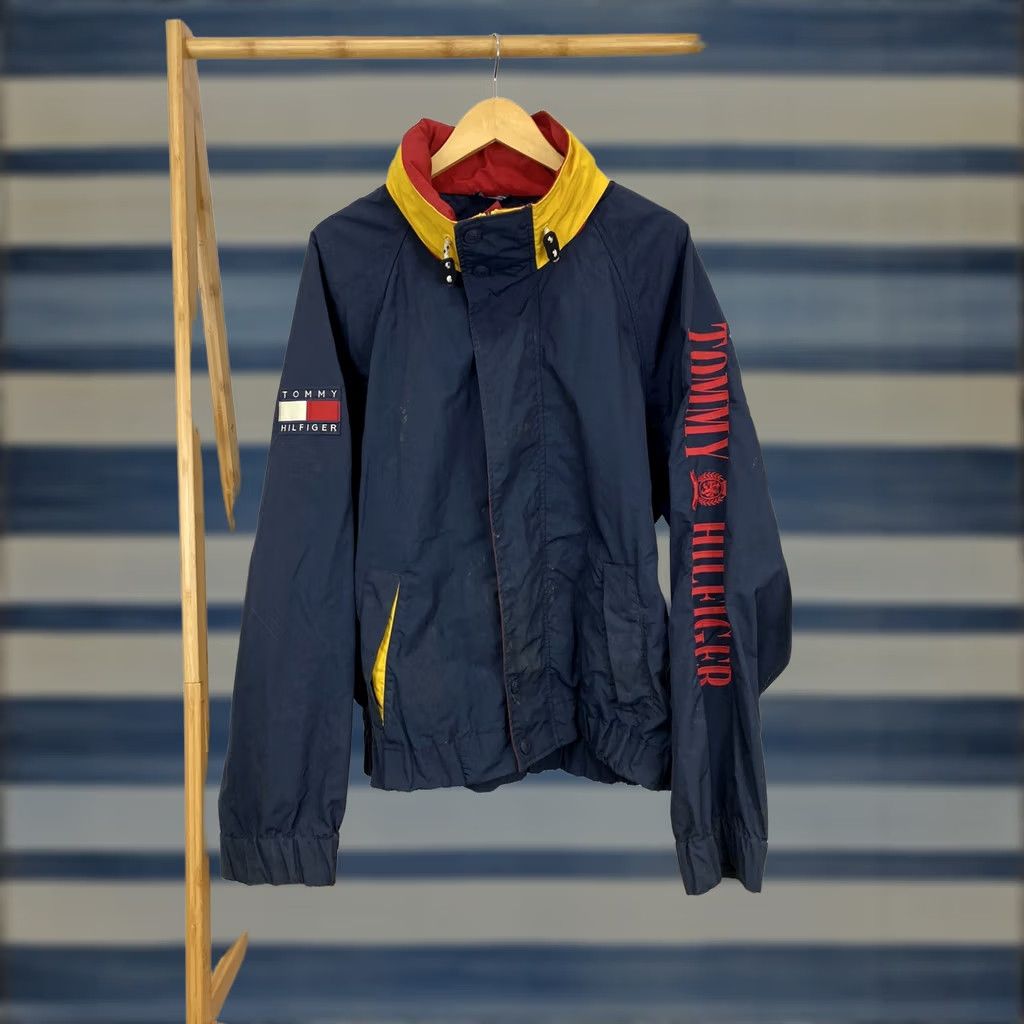 Tommy Hilfiger VTG Tommy Hilfiger Spell Out Flag Windbreaker Full Zip Hooded Jacket XL Mens Blue Red Yellow Size US XL / EU 56 / 4 - 1 Thumbnail