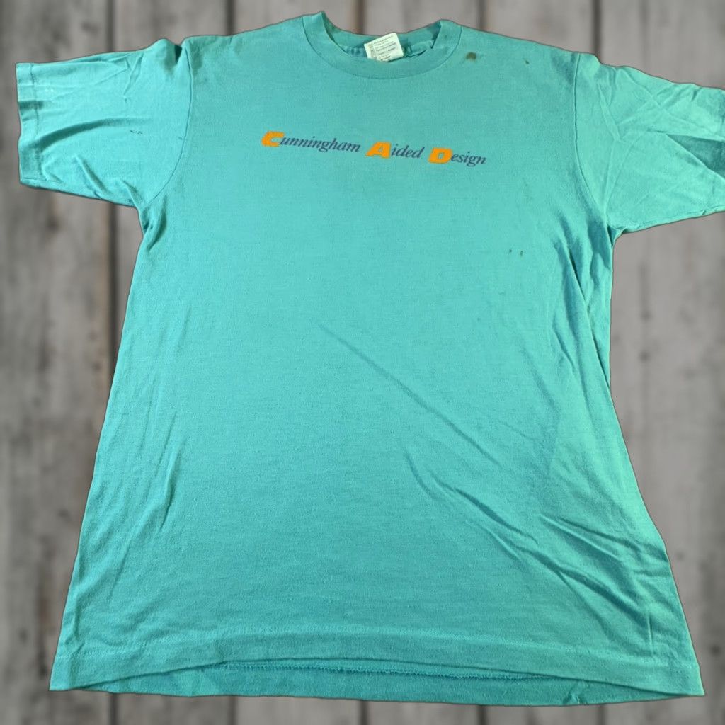 Hanes VINTAGE Nishiki Shirt Mens L Blue Cunningham Aided Design 90s Cycling MTB USA Nishiki N logo Graphic Print Crew Neck Short Sleeve Hanes Fifty-Fifty Size US L / EU 52-54 / 3 - 1 Thumbnail