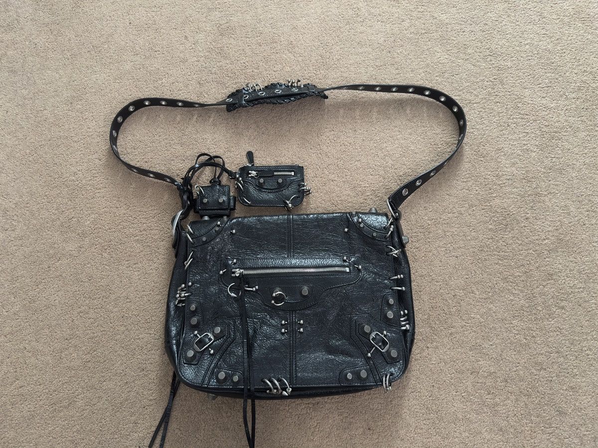 Balenciaga Le Cagole Pierced Messenger Bag in Black, Men's