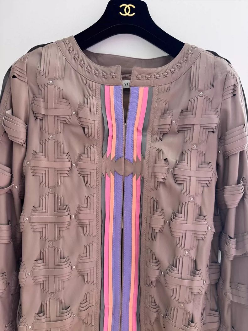 Versace A heavily knitted long leather jacket