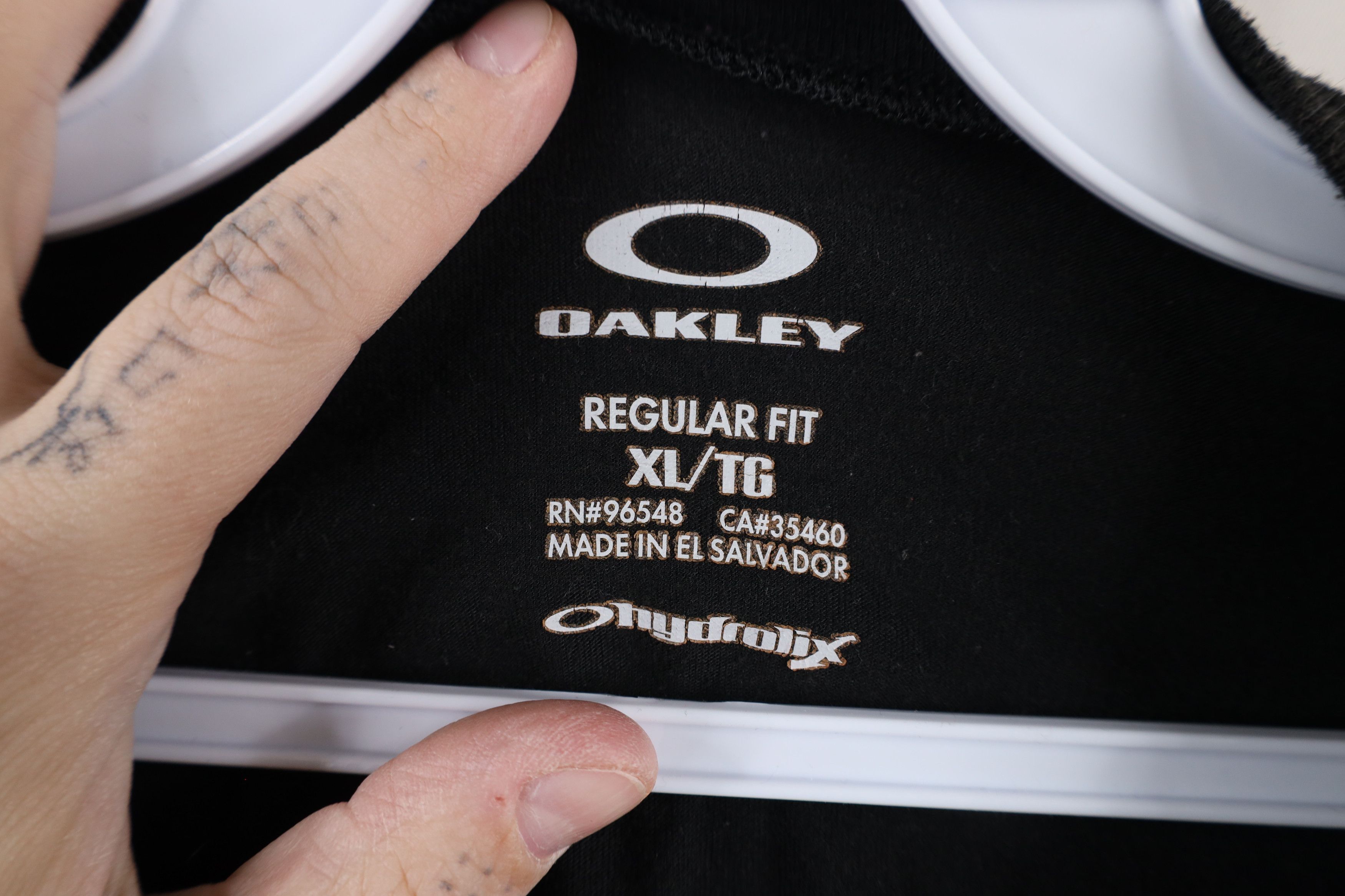 Oakley × Vintage Vintage Oakley Hydrolix Logo Knit Short Sleeve T-Shirt Black Size US XL / EU 56 / 4 - 6 Thumbnail