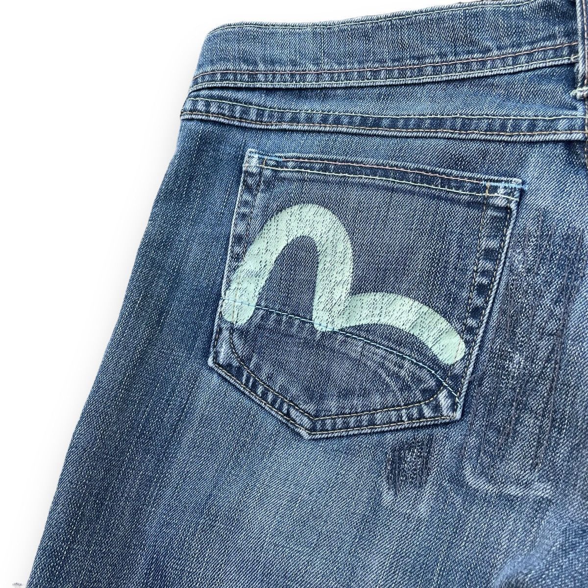 VINTAGE Y2K EVISU X PUMA DISTRESSED WASHED DENIM PANTS
