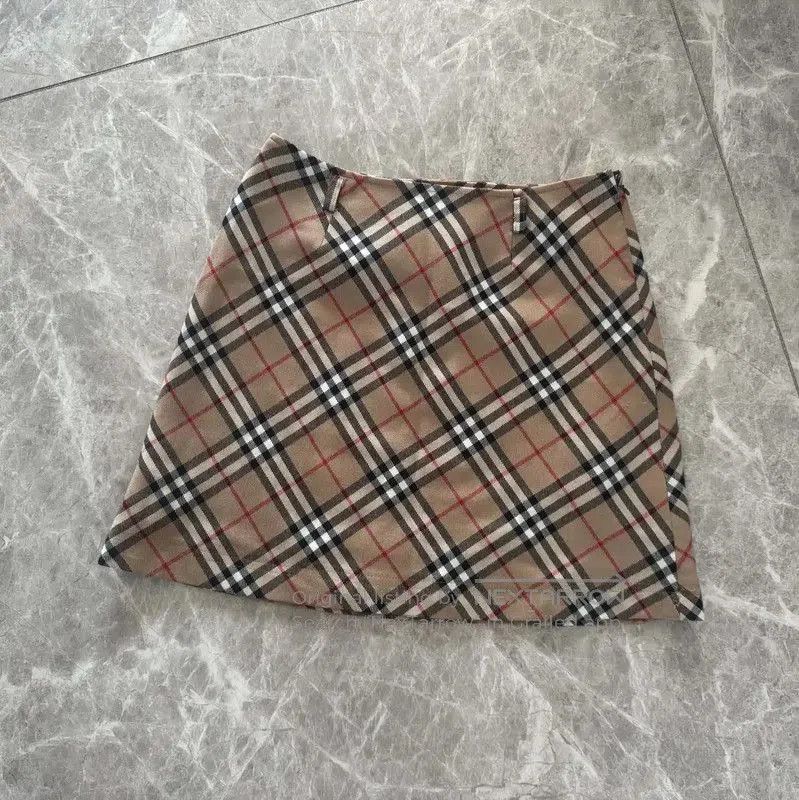 Burberry Burberry Wool Mini Skirt in Khaki. Size 23" - 1 Thumbnail