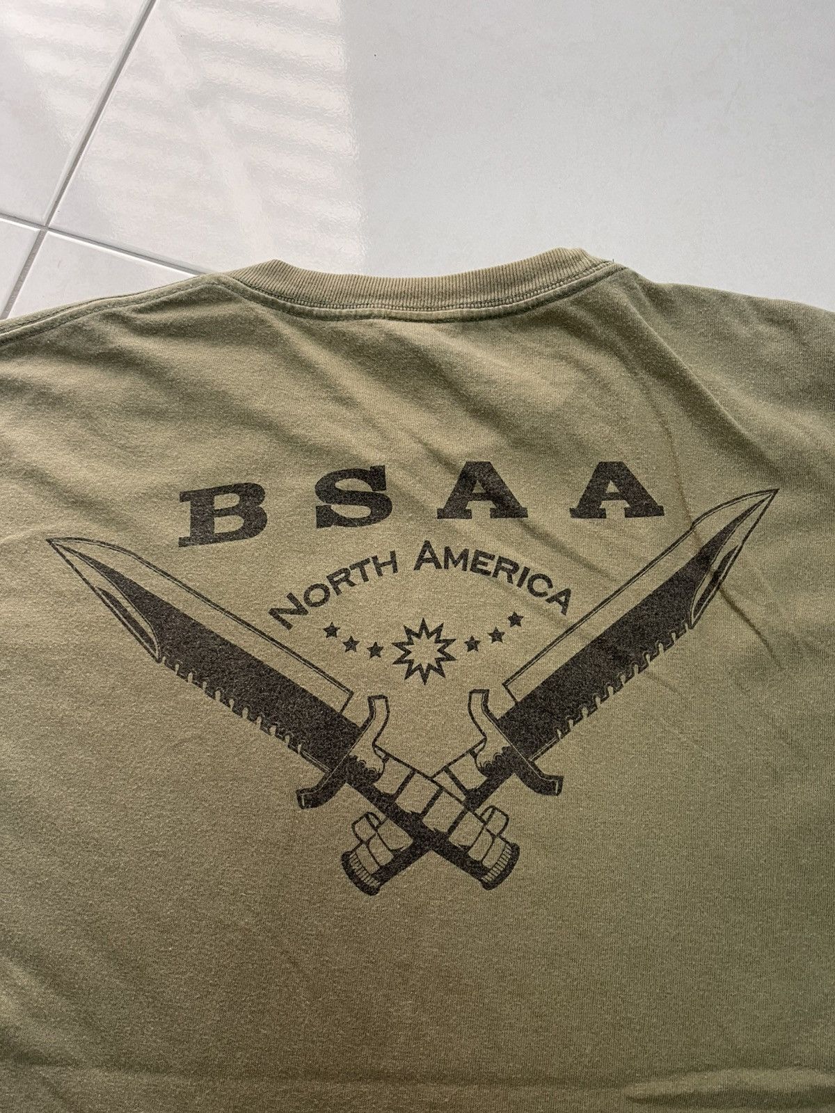 Vintage VINTAGE CAPCOM BSAA NORTH AMERICA BACK HIT VERY RARE Size US L / EU 52-54 / 3 - 2 Thumbnail