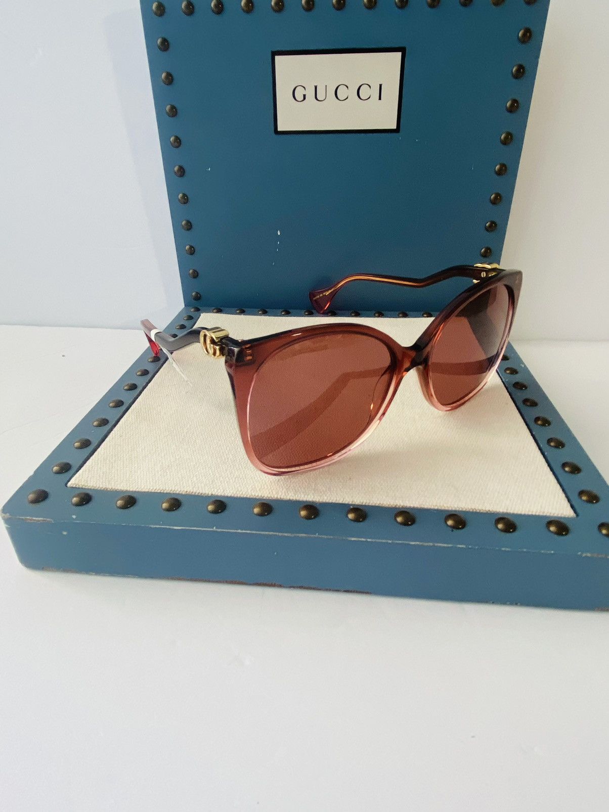 image of Gucci Gg1010S 004 Sunglasses Women's Burgundy Transparent in Pink